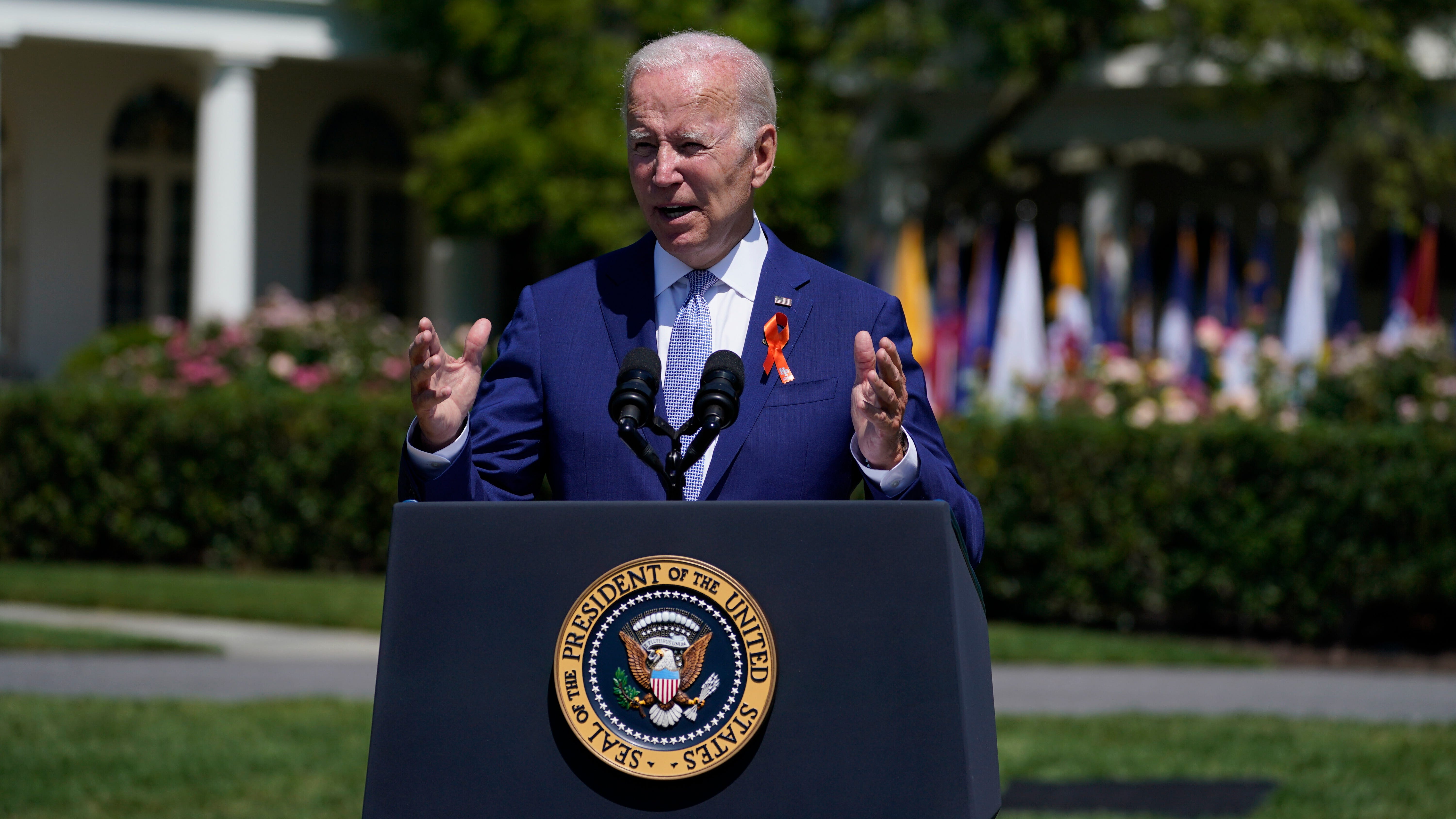 Biden celebration of new gun law clouded by latest shooting