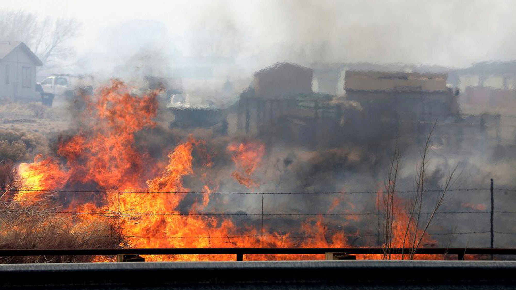 Crews brace for strong winds, explosive fire growth in West