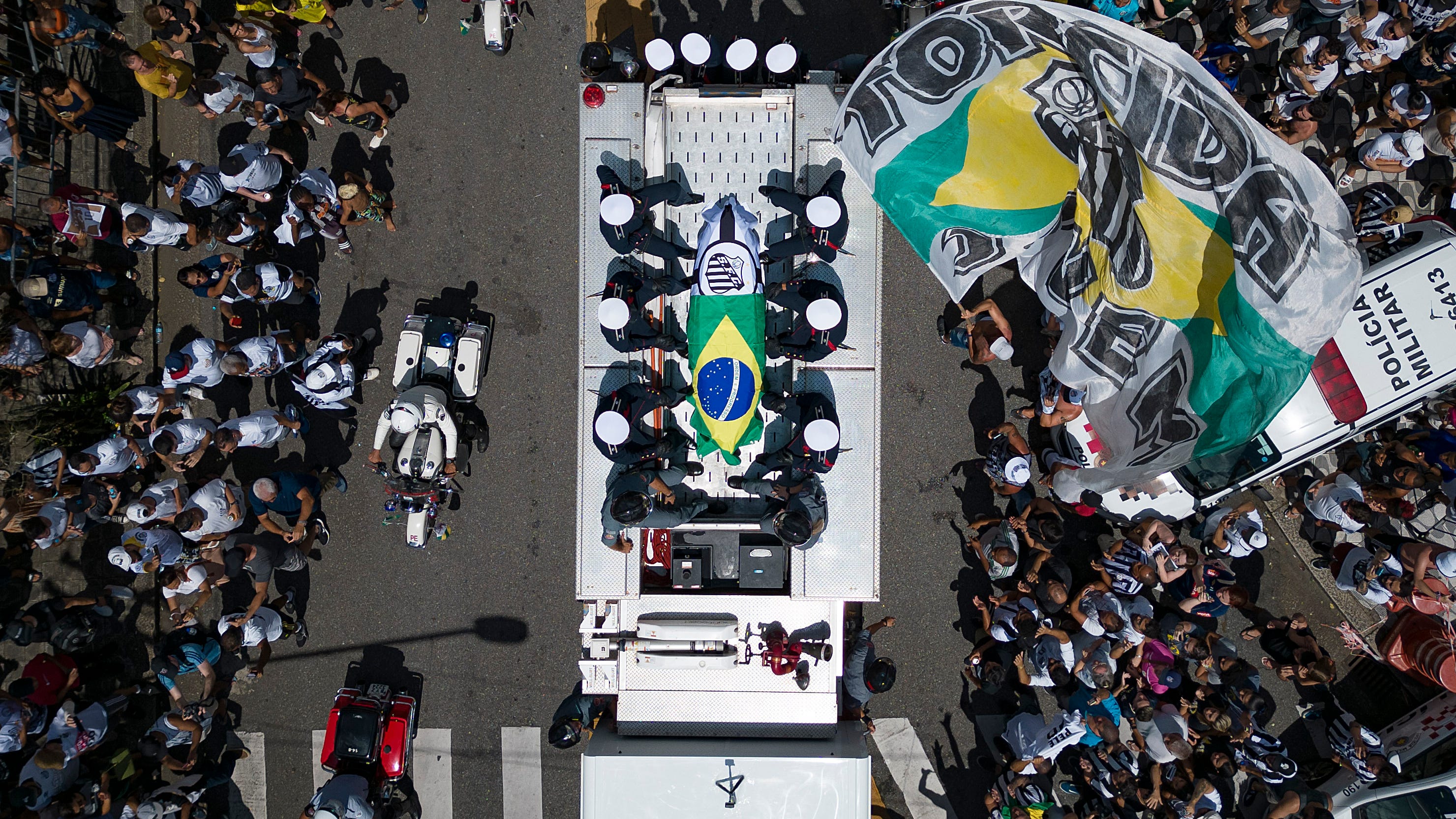 Pelé buried at cemetery in Brazilian city he made famous