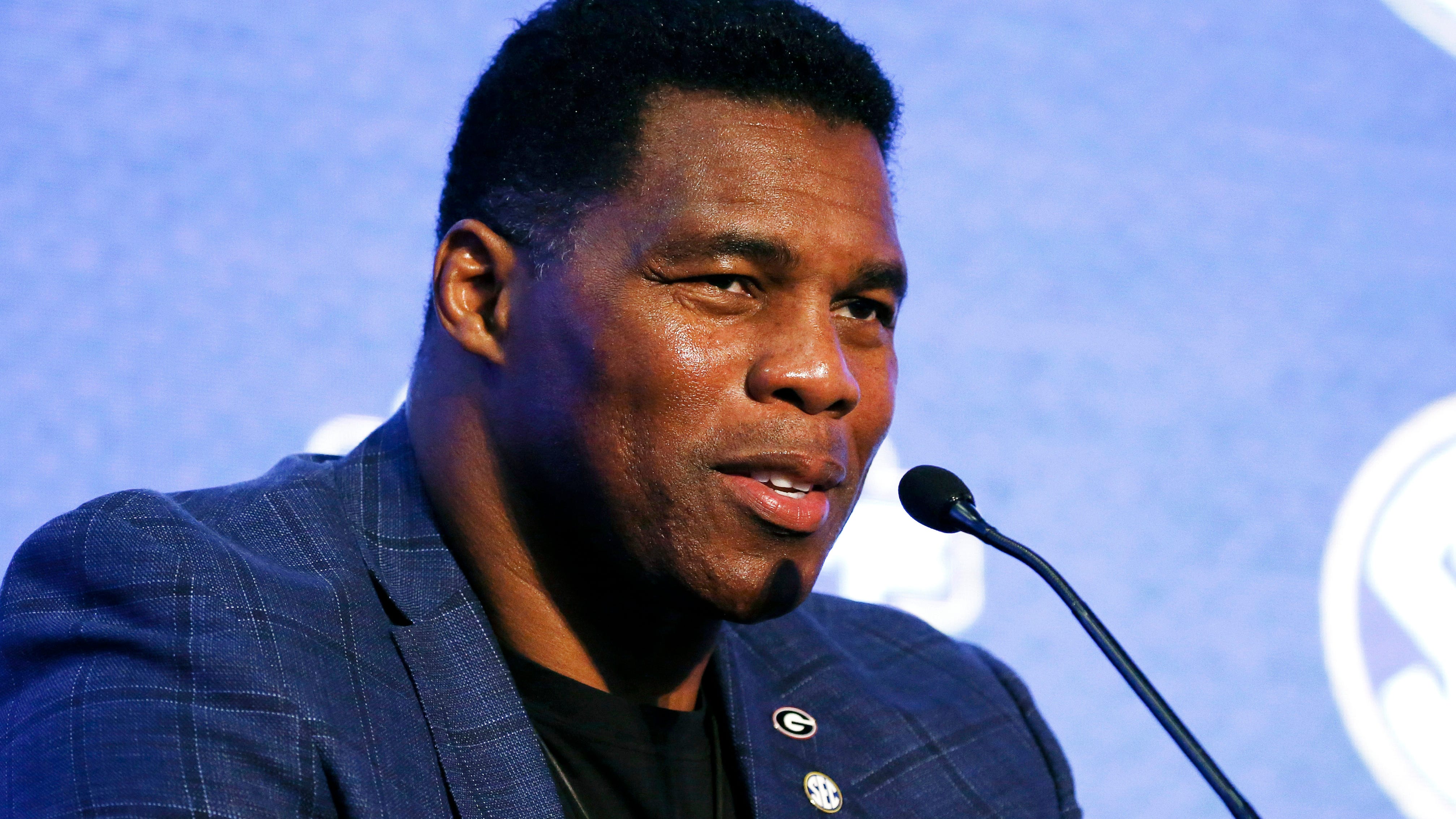 As Herschel Walker eyes Senate run, a turbulent past emerges