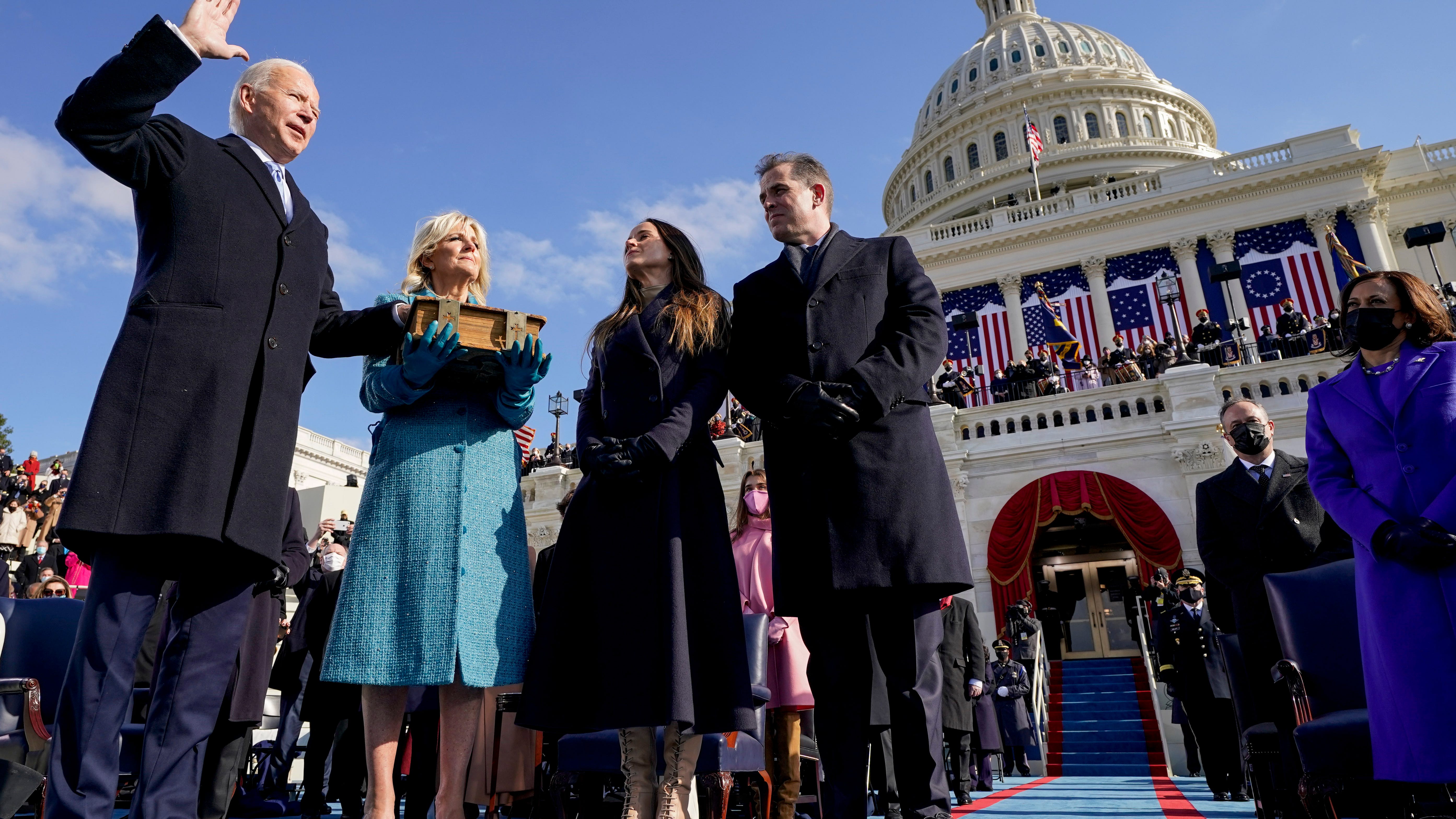 Biden takes the helm as president: 'Democracy has prevailed'