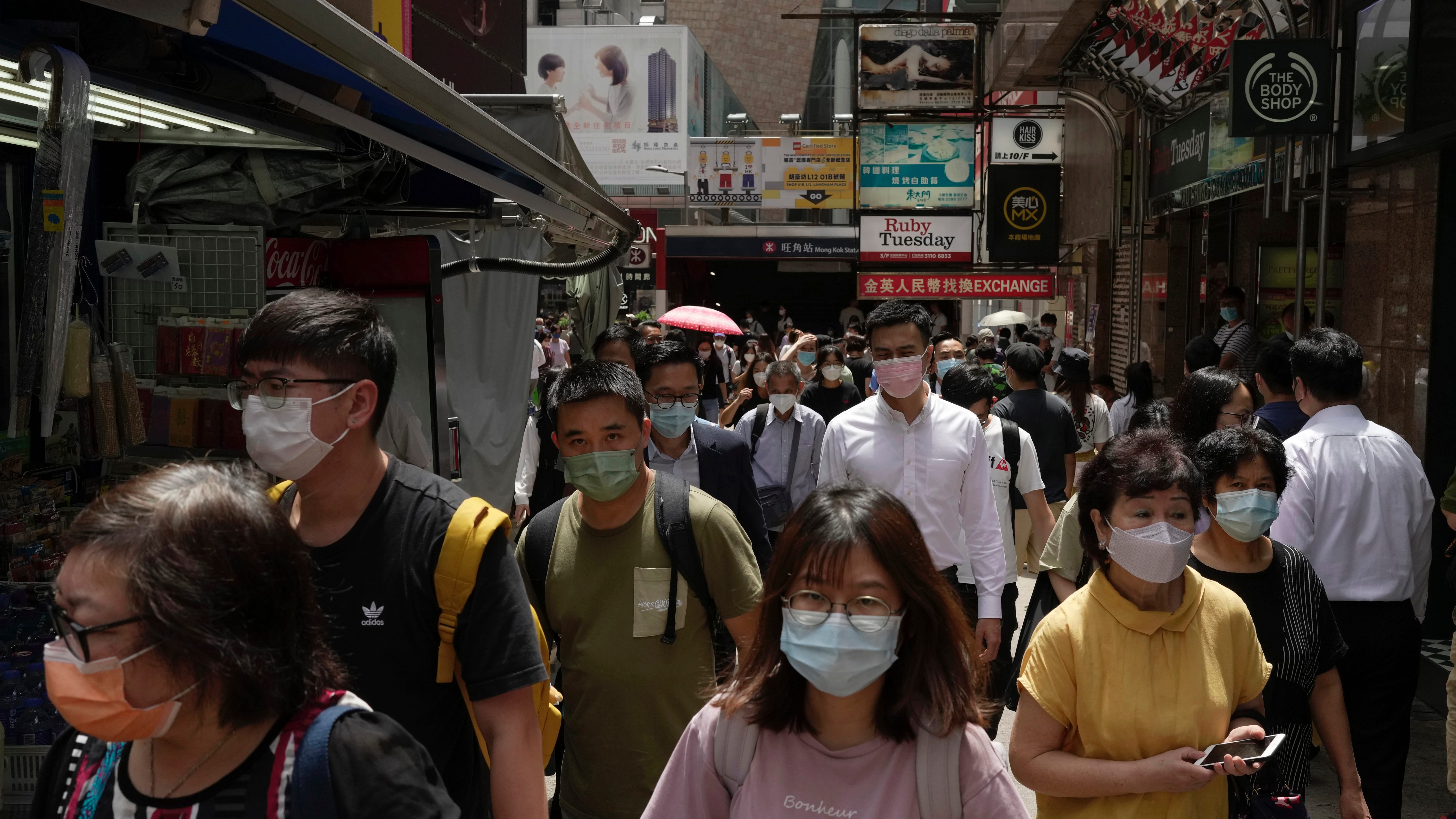 Hong Kong cuts COVID hotel quarantine to 3 days for arrivals