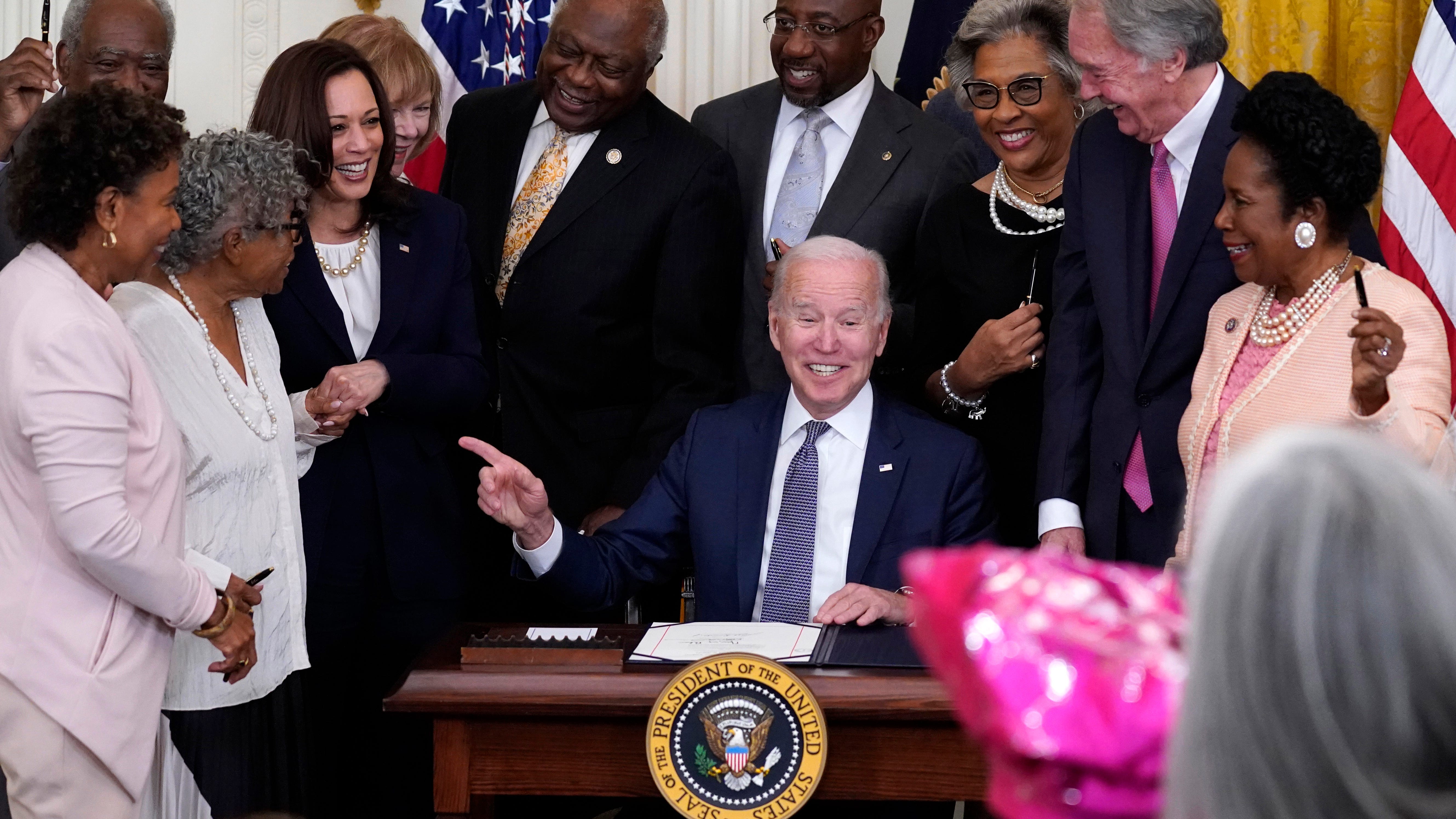 Black Americans laud Juneteenth holiday, say more work ahead