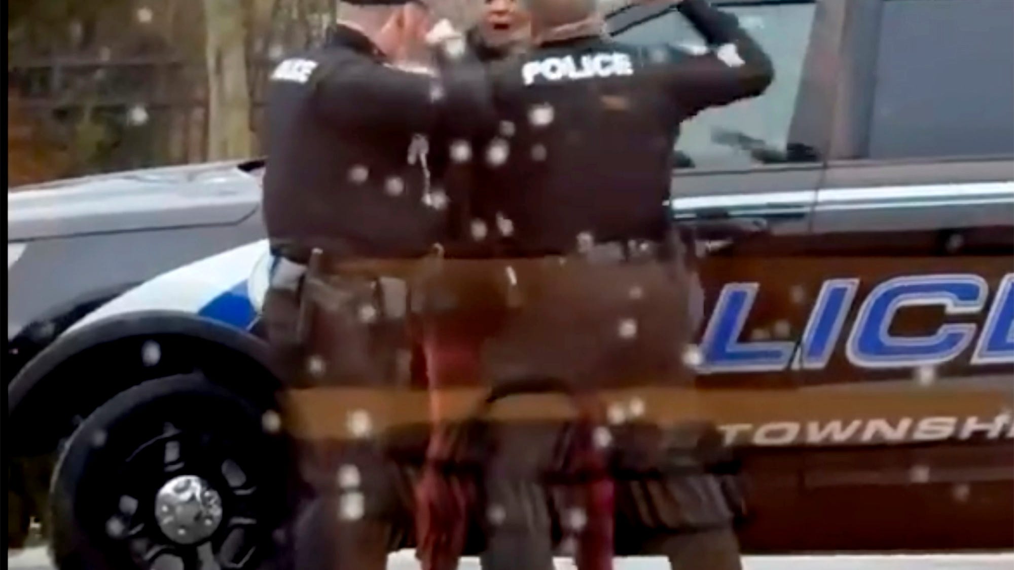 Officer who hit woman in McDonald's dispute placed on leave