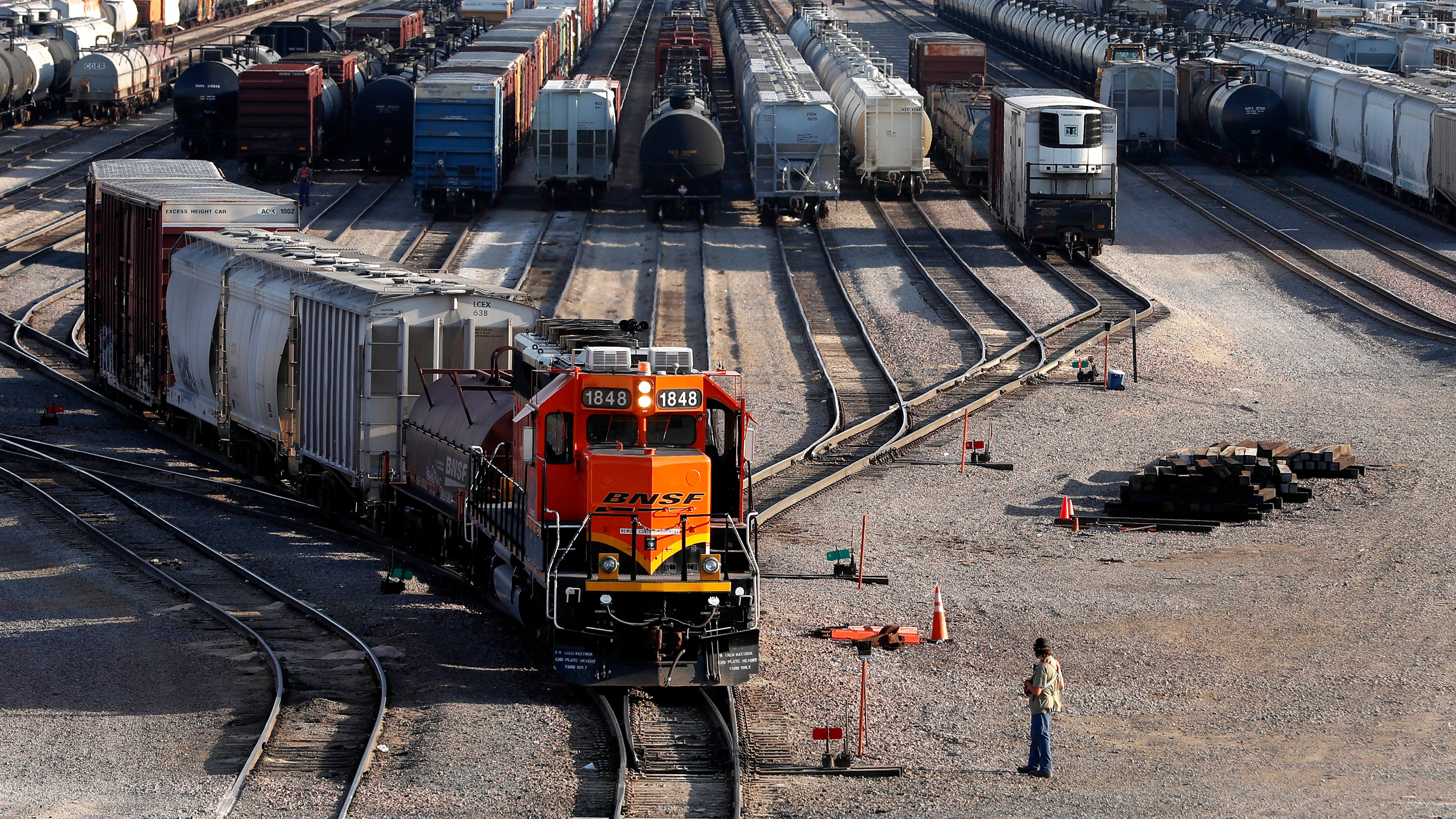 Railroads back plan calling for 24% raises but workers wary