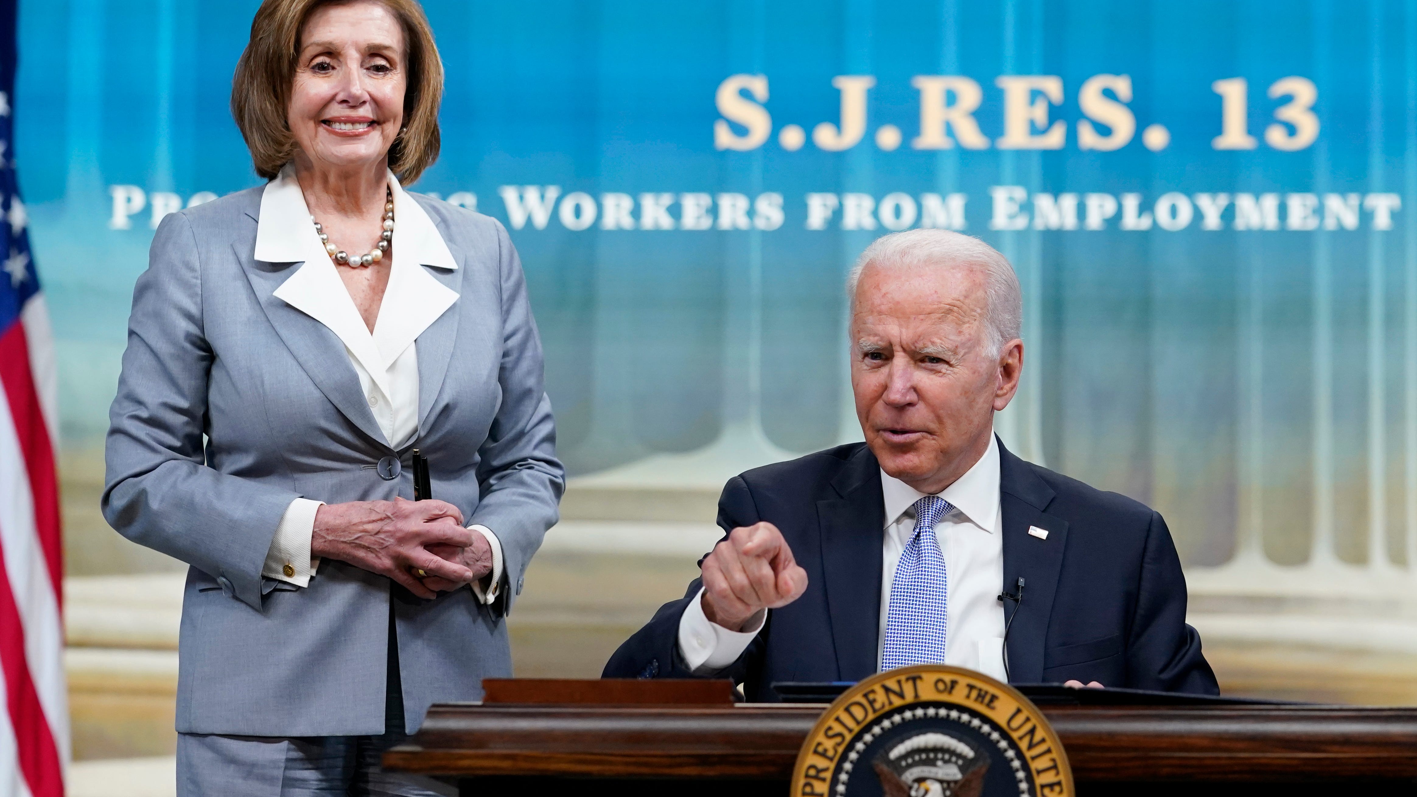 Biden signs three bills to overturn Trump-era rules