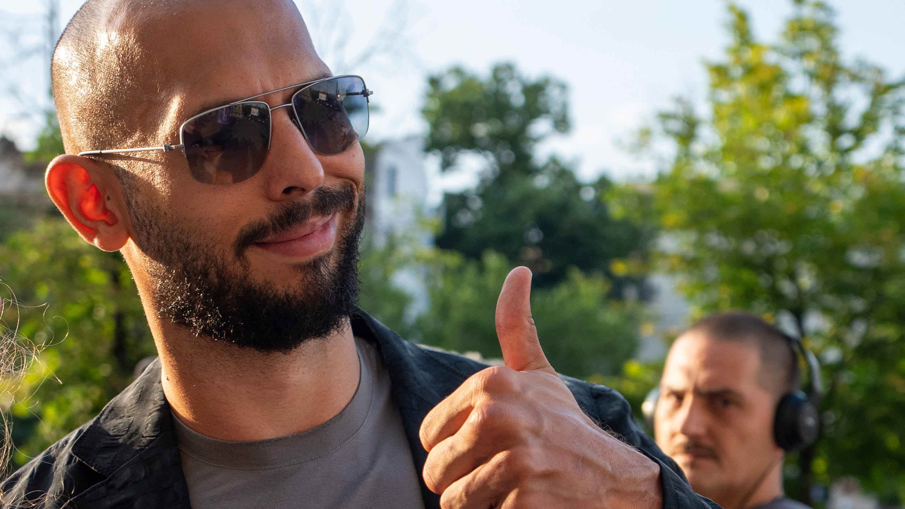 Influencer Andrew Tate released from house arrest while he awaits human trafficking and rape trial