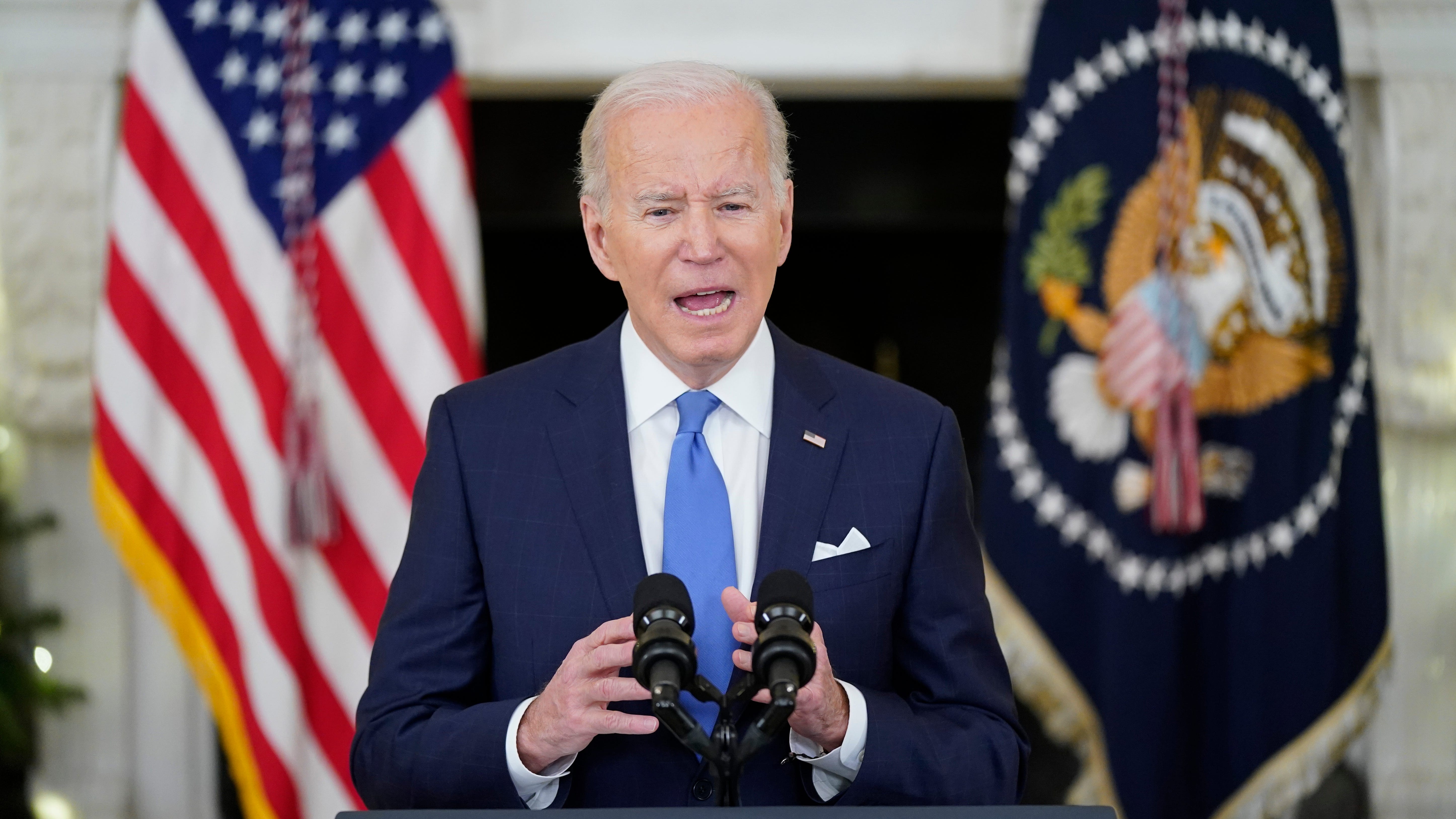 Biden pivots to home tests to confront omicron surge
