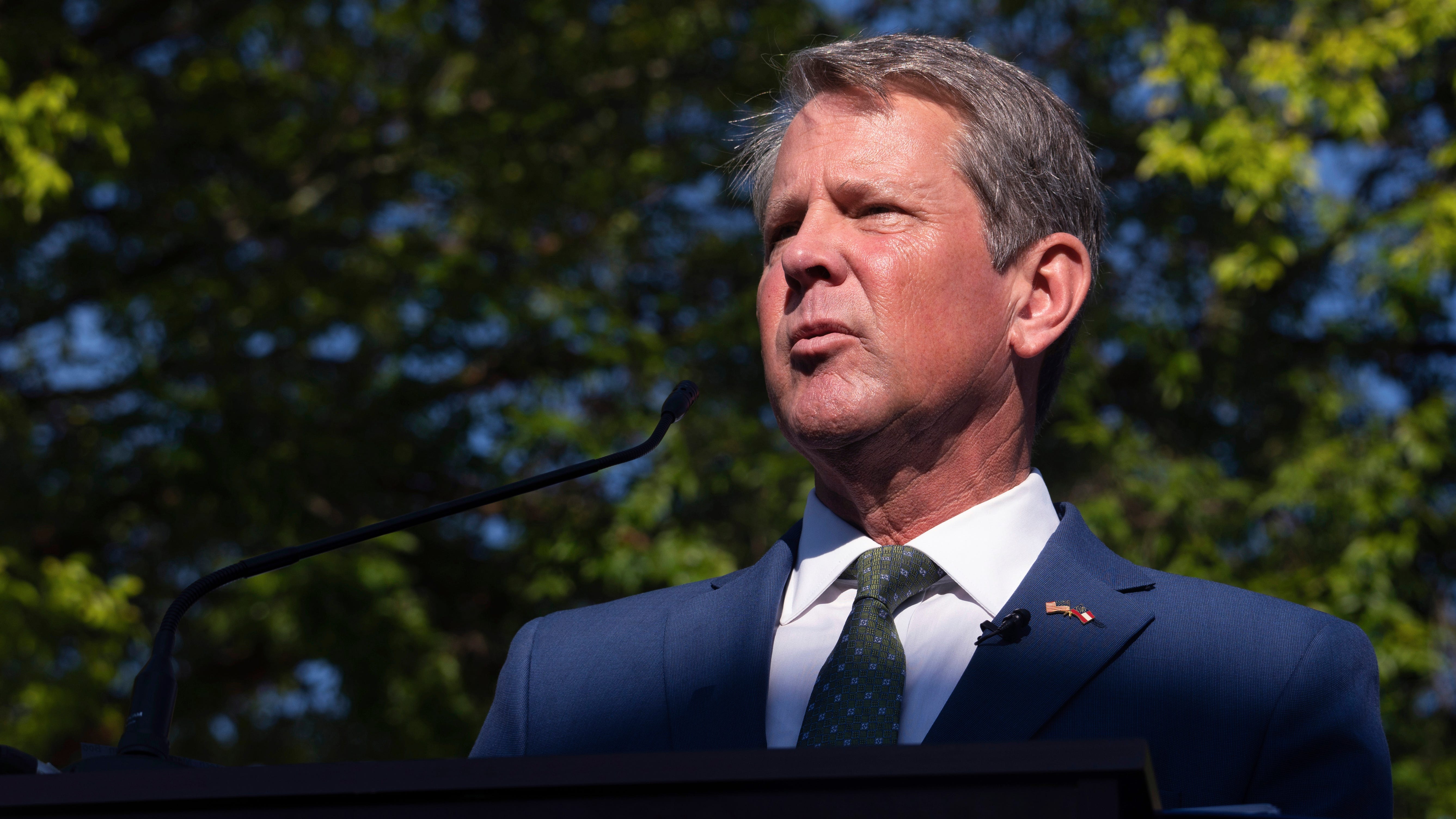 Georgia's Kemp seeks tax breaks, rebutting Abrams on economy