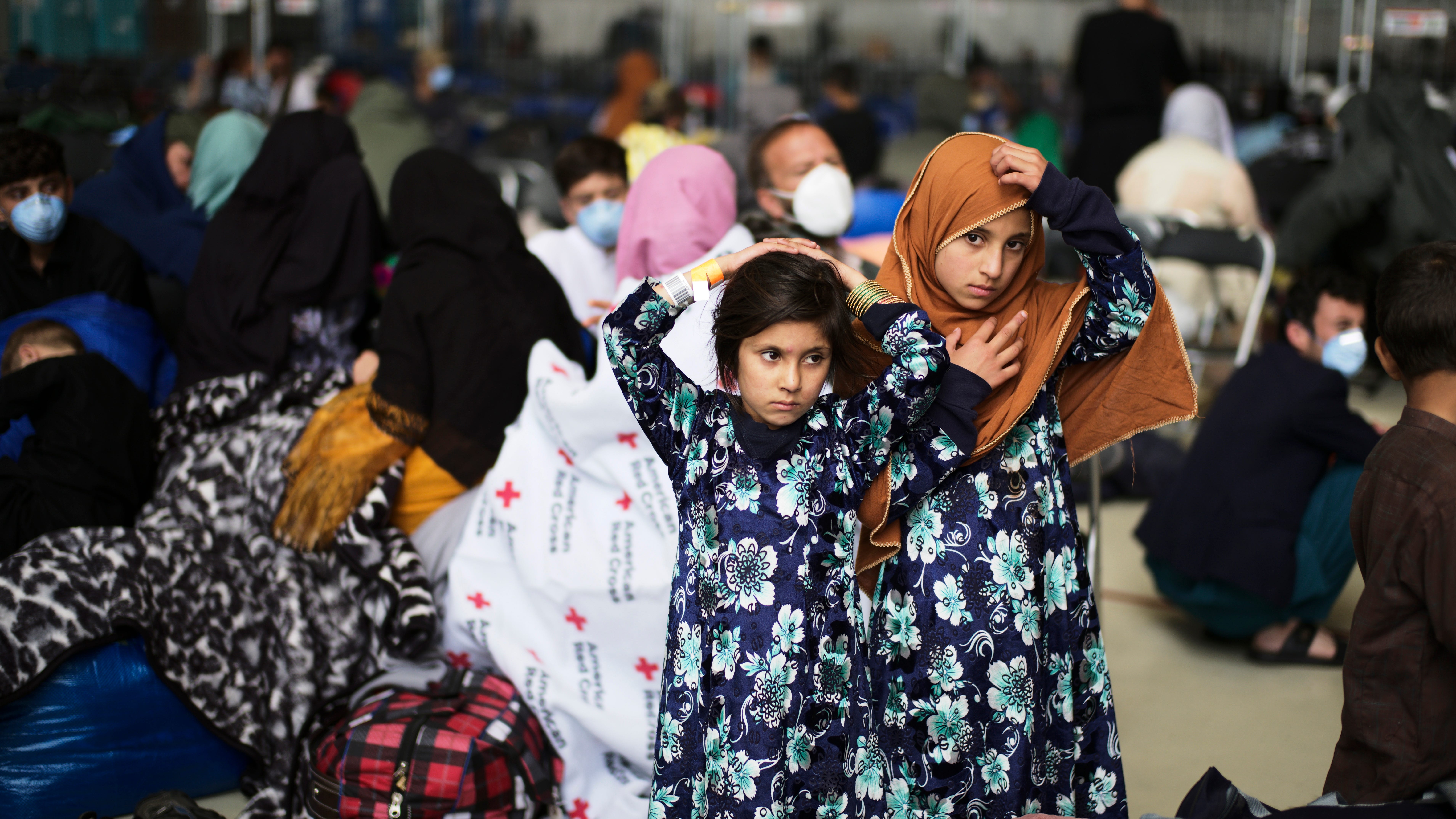 The Latest: US veterans hope more Afghans at risk can leave