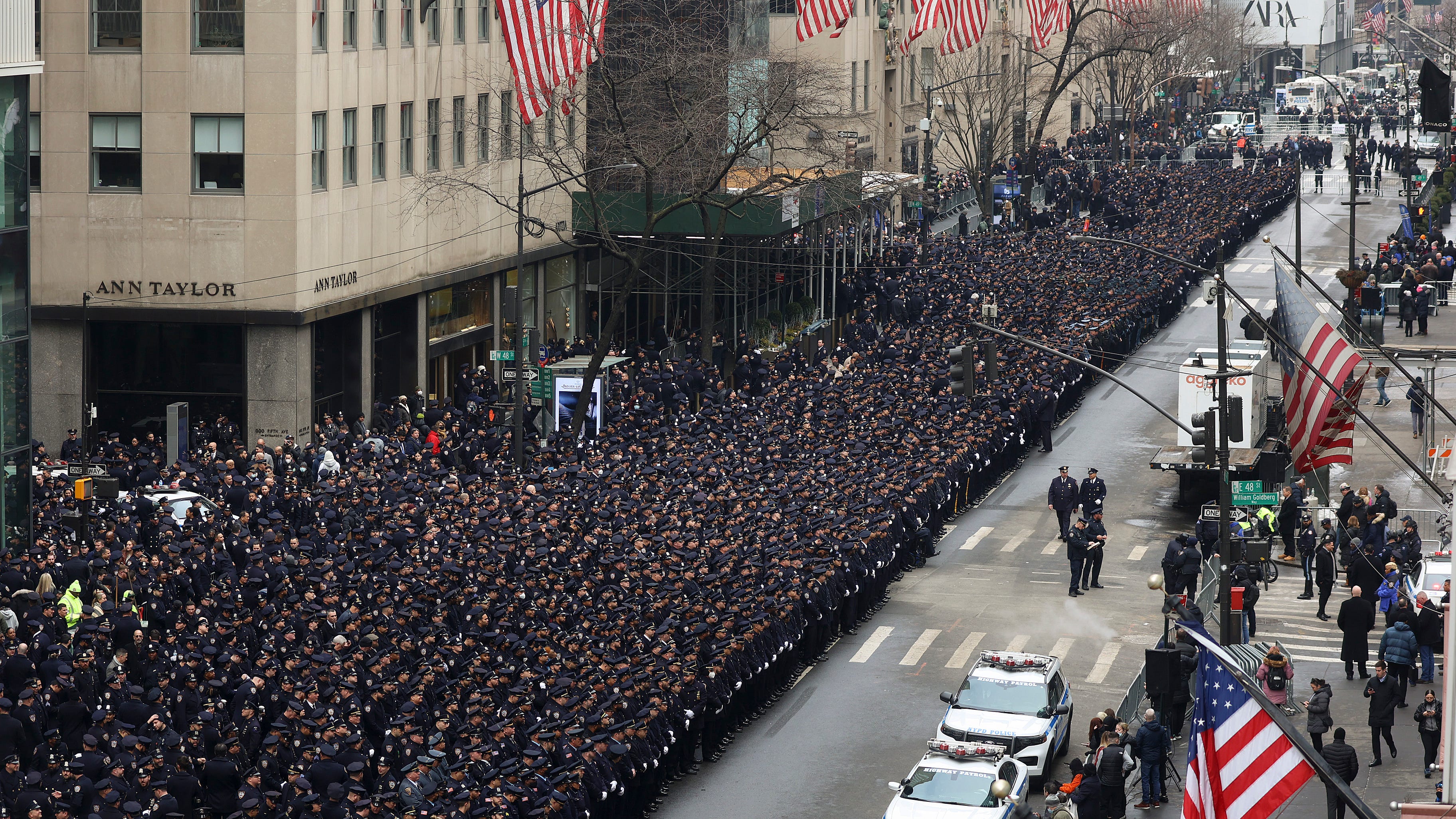 NYC honors officer at funeral hours after another is shot