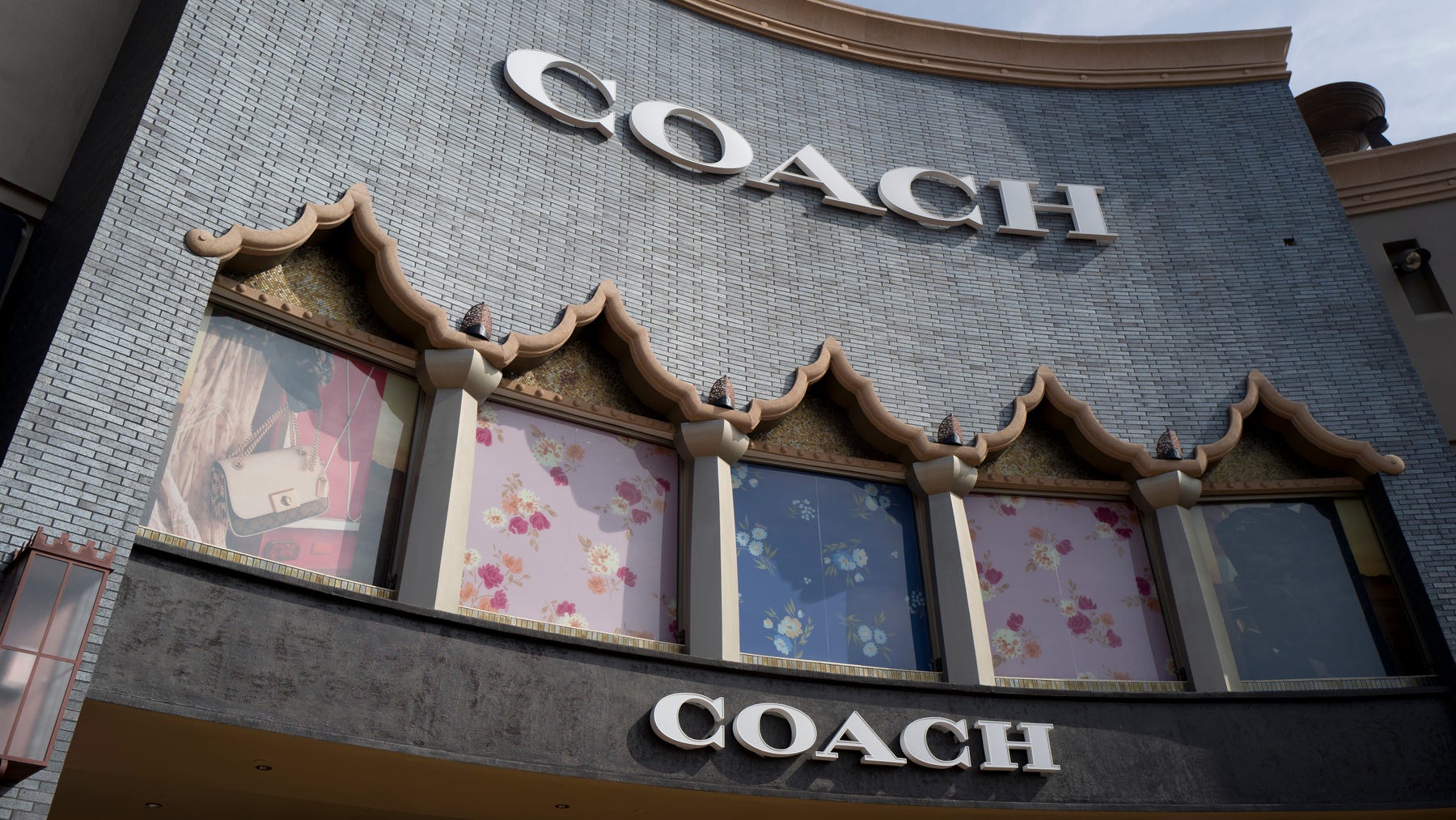 Big fashion is getting bigger. Parent of Coach will buy Versace owner Capri in $8.5 billion deal
