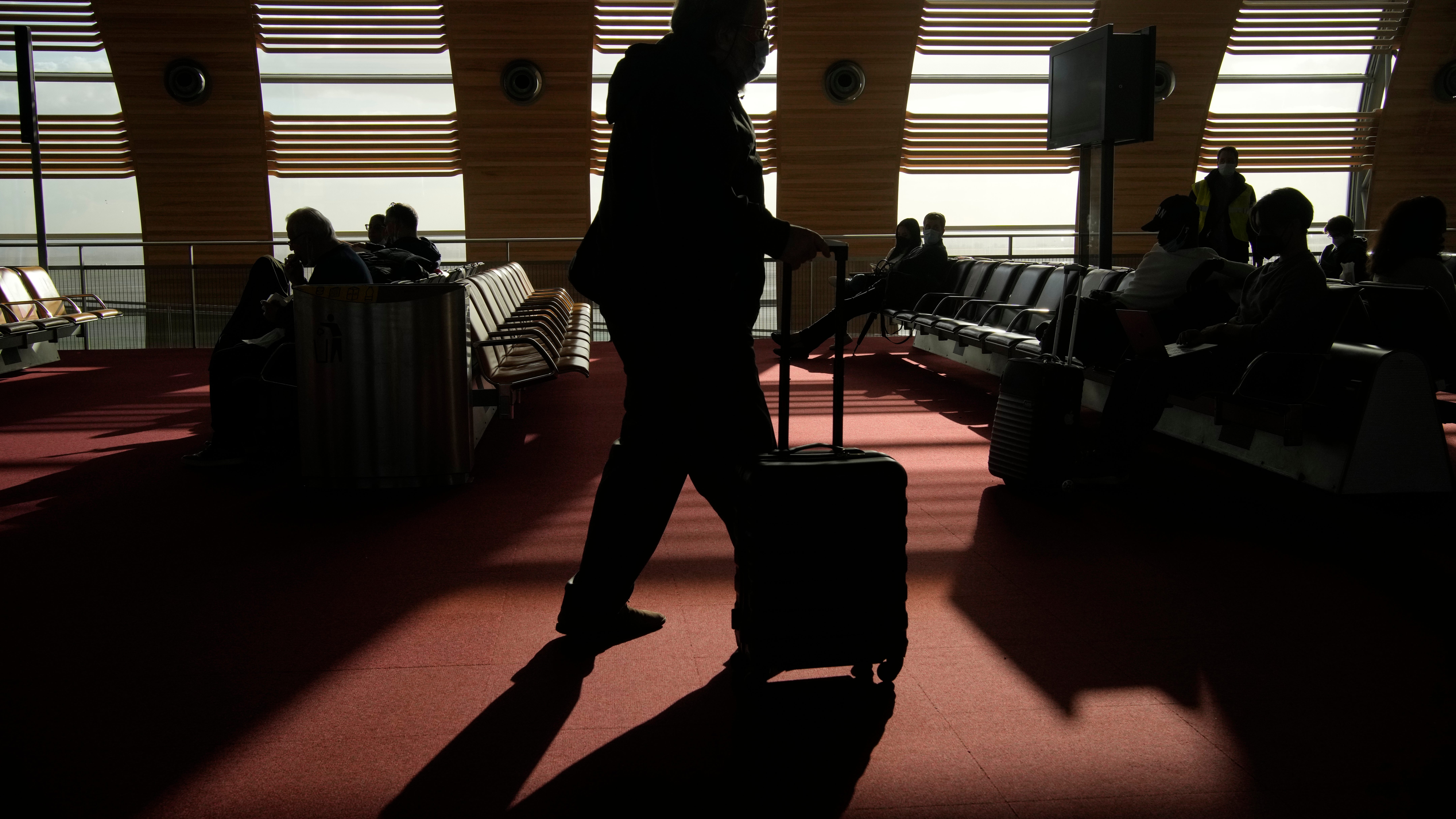 As rules ease, travelers head to US for emotional reunions