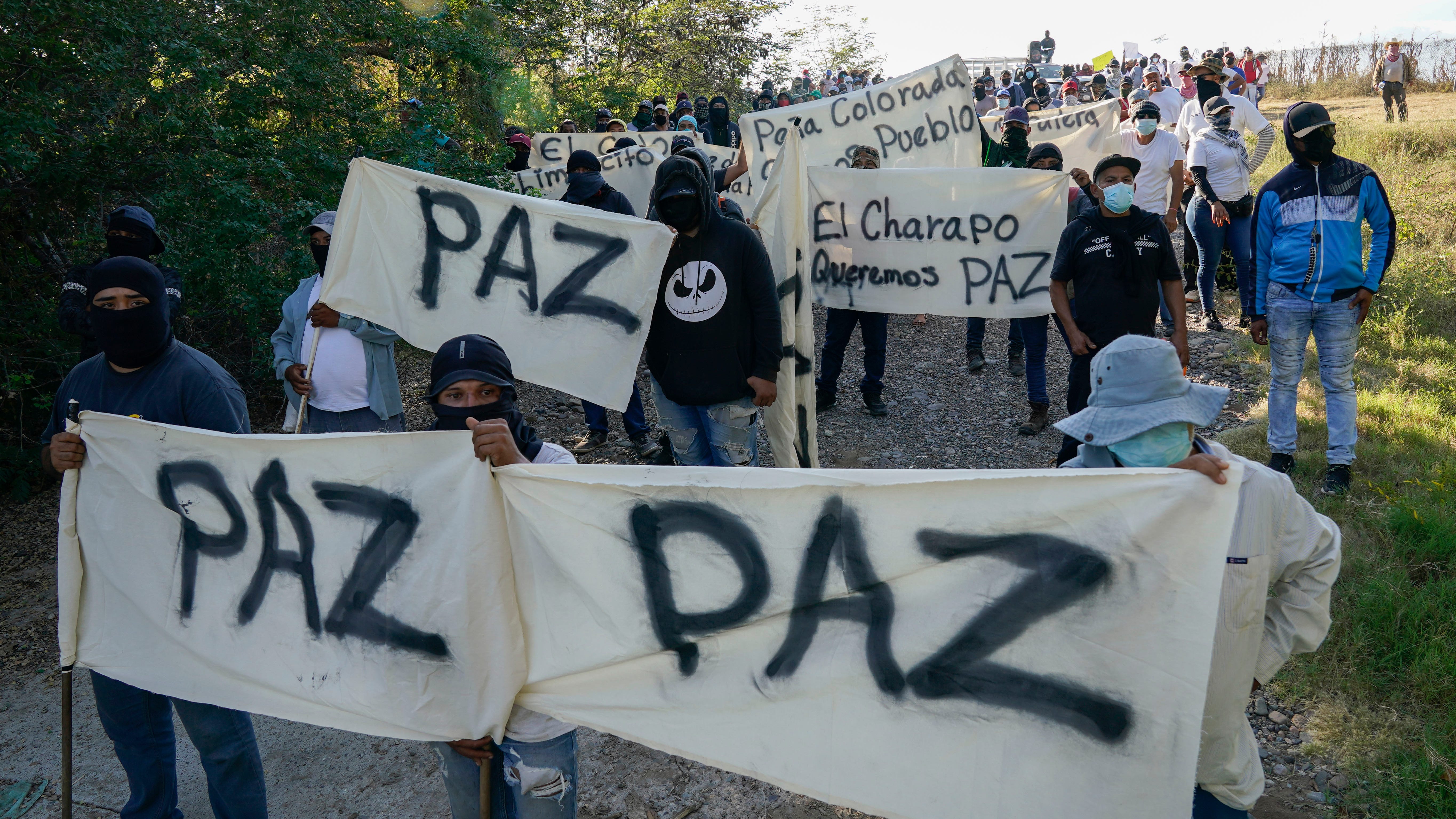 Mexico's drug war uses drones, human shields, gunships