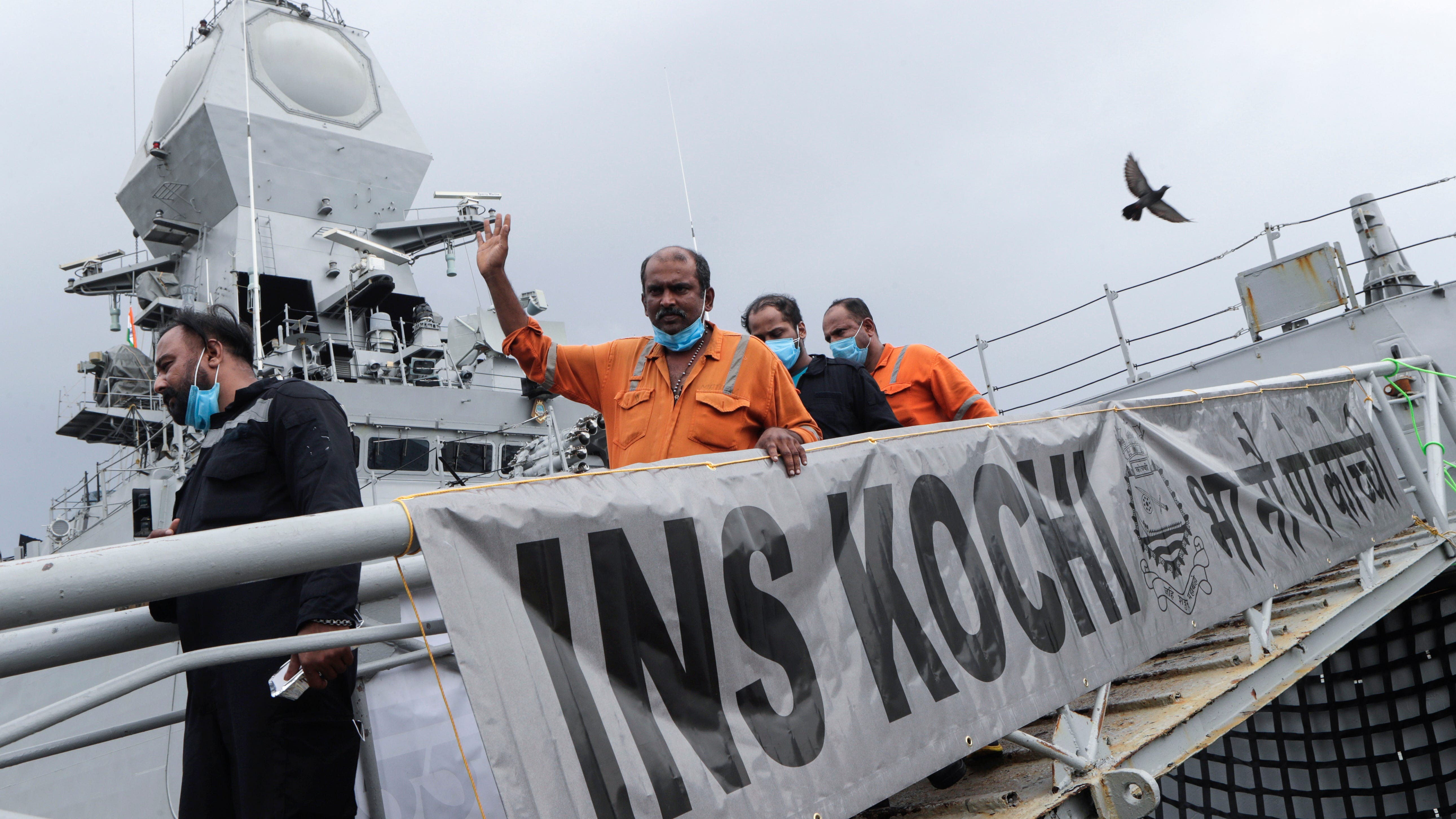 Indian navy recovers 26 bodies from barge that sank in storm