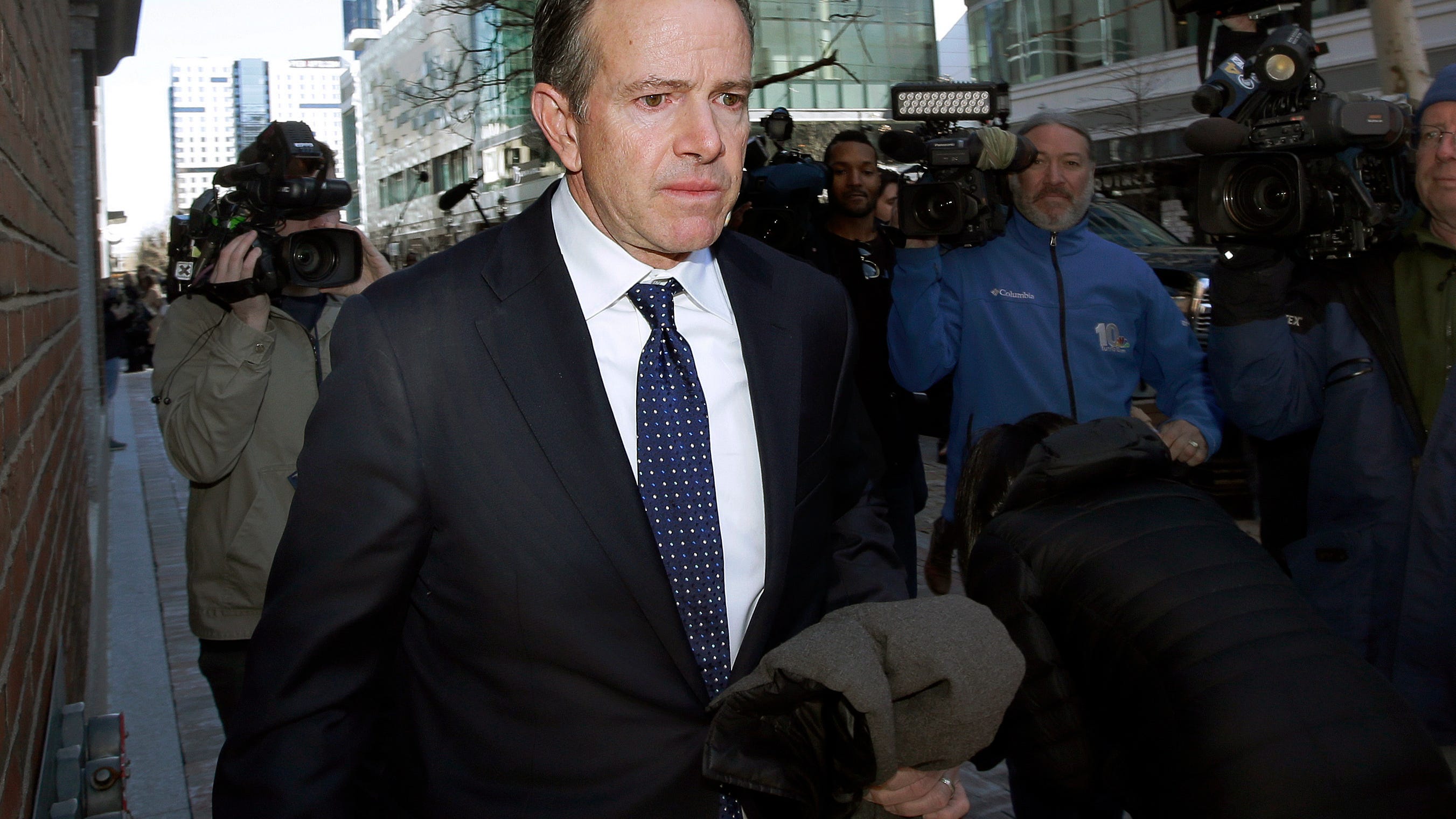 Ex-Georgetown coach gets 2 1/2 years in bribe scandal