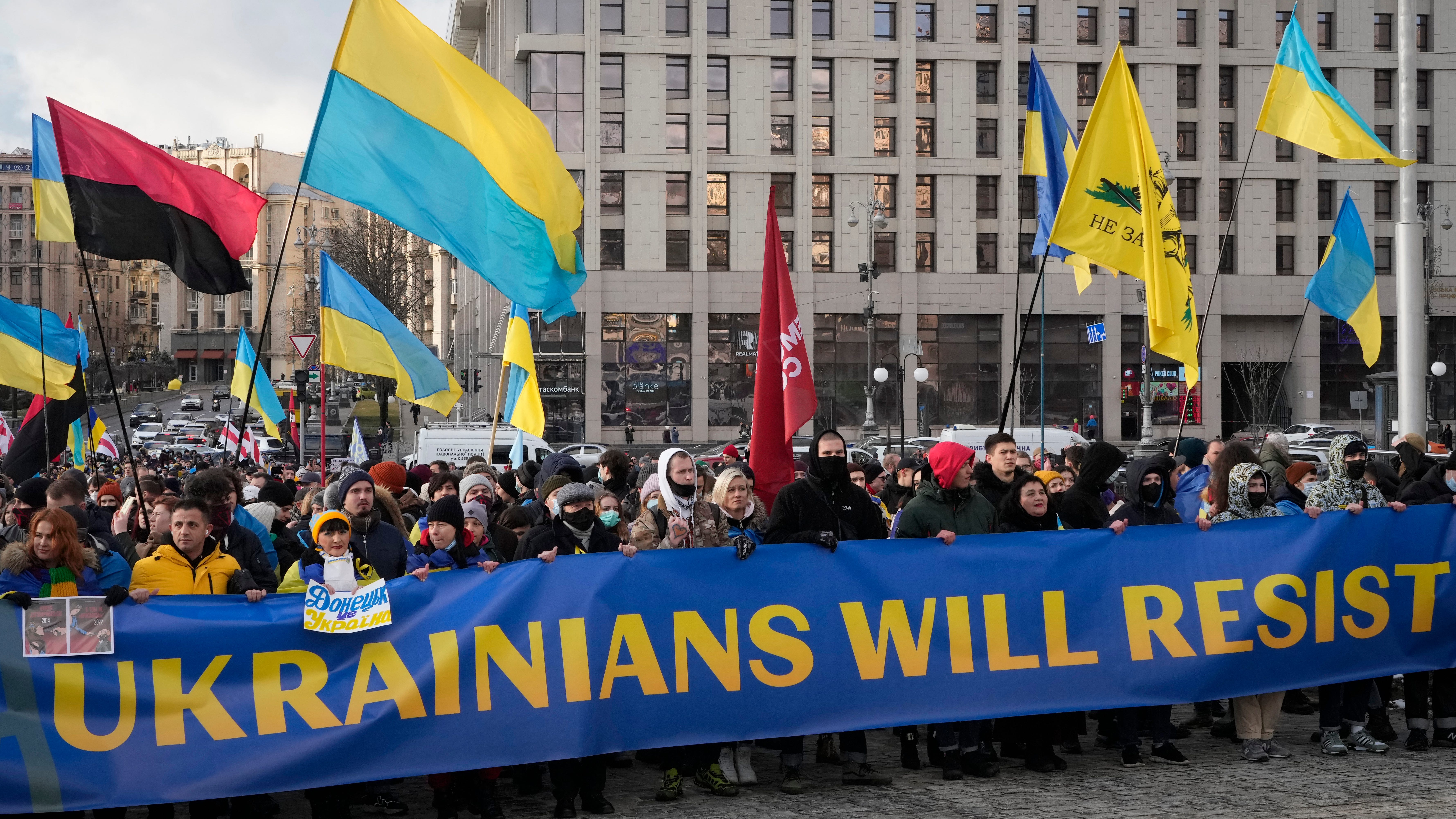 Biden warns Putin of 'severe costs' of Ukraine invasion