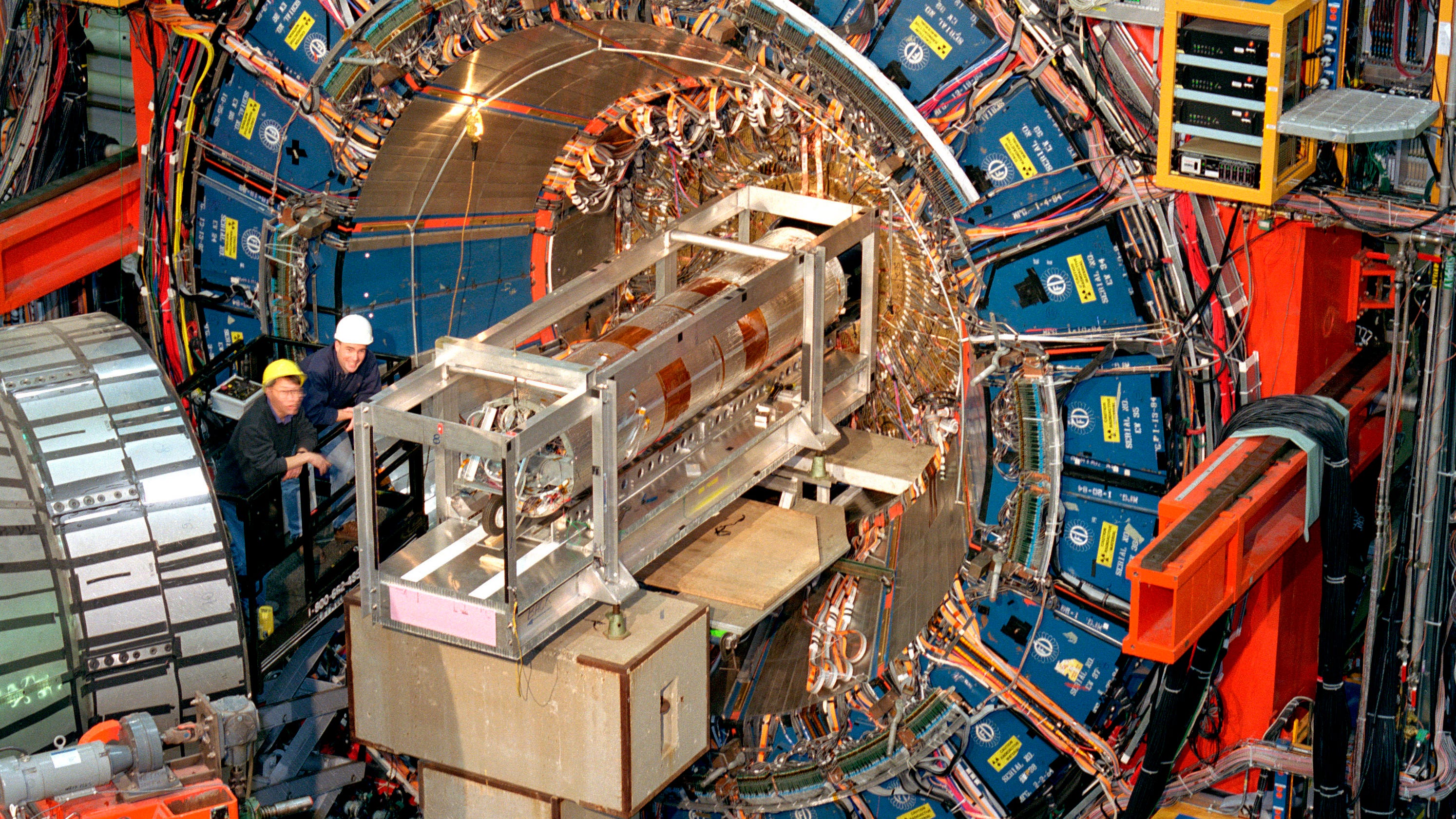 Key particle weighs in a bit heavy, confounding physicists