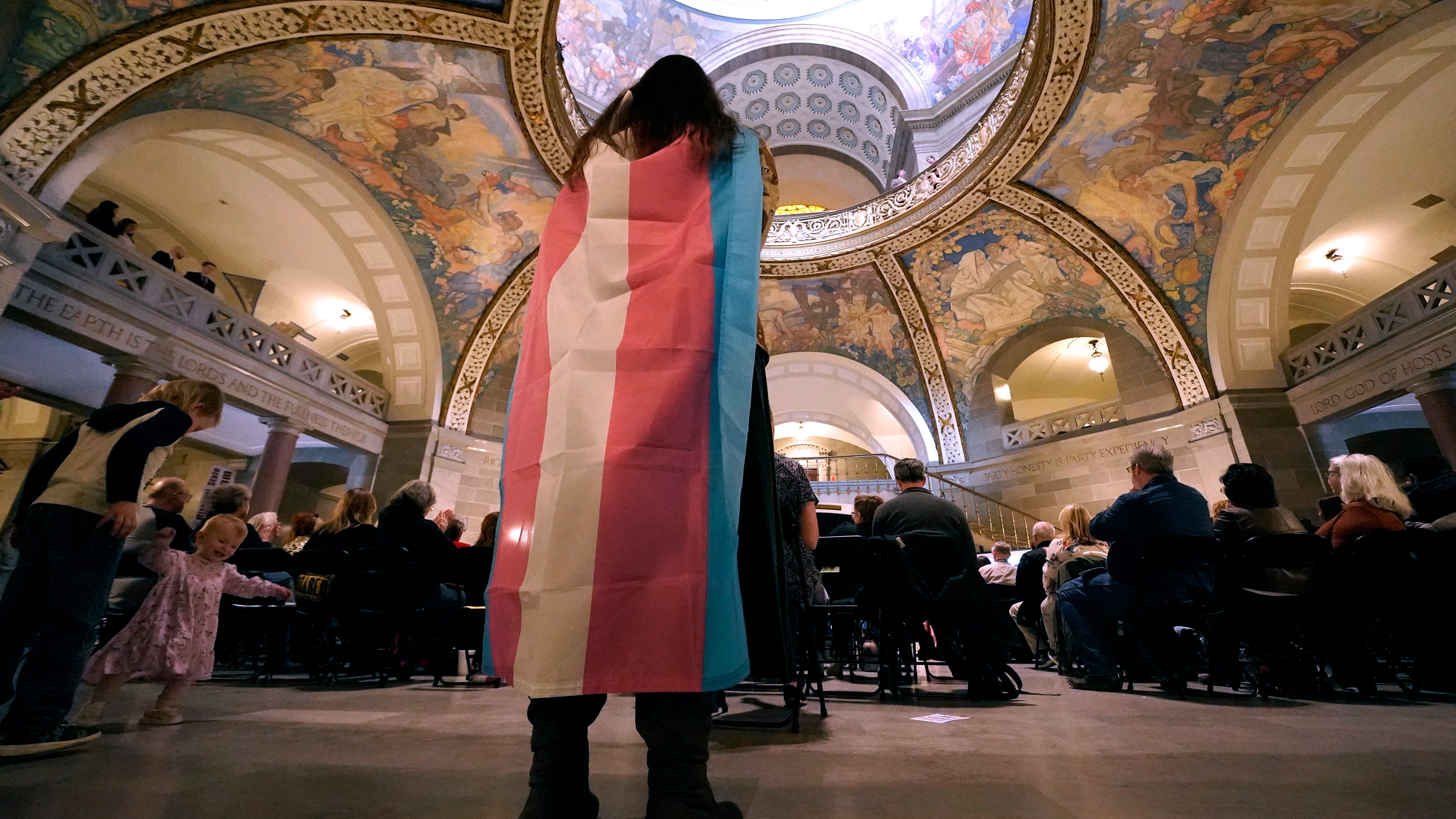 Missouri governor signs ban on transgender health care, school sports