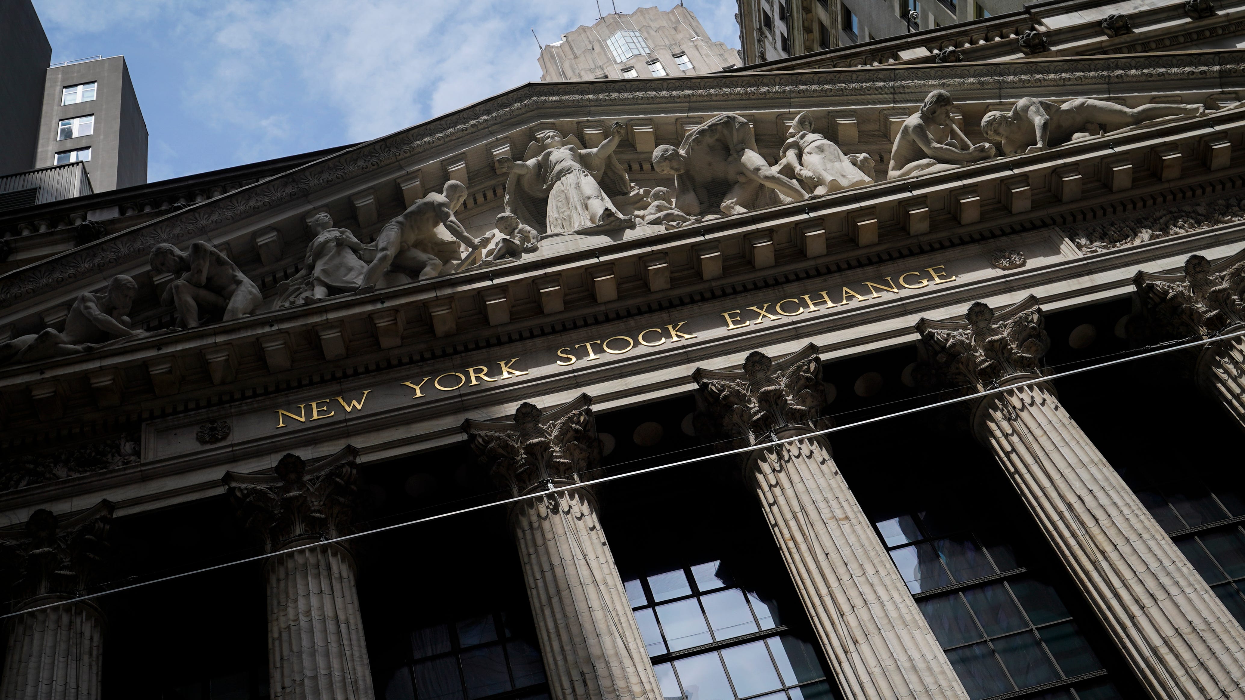 Stocks open higher as earnings reports for companies begin