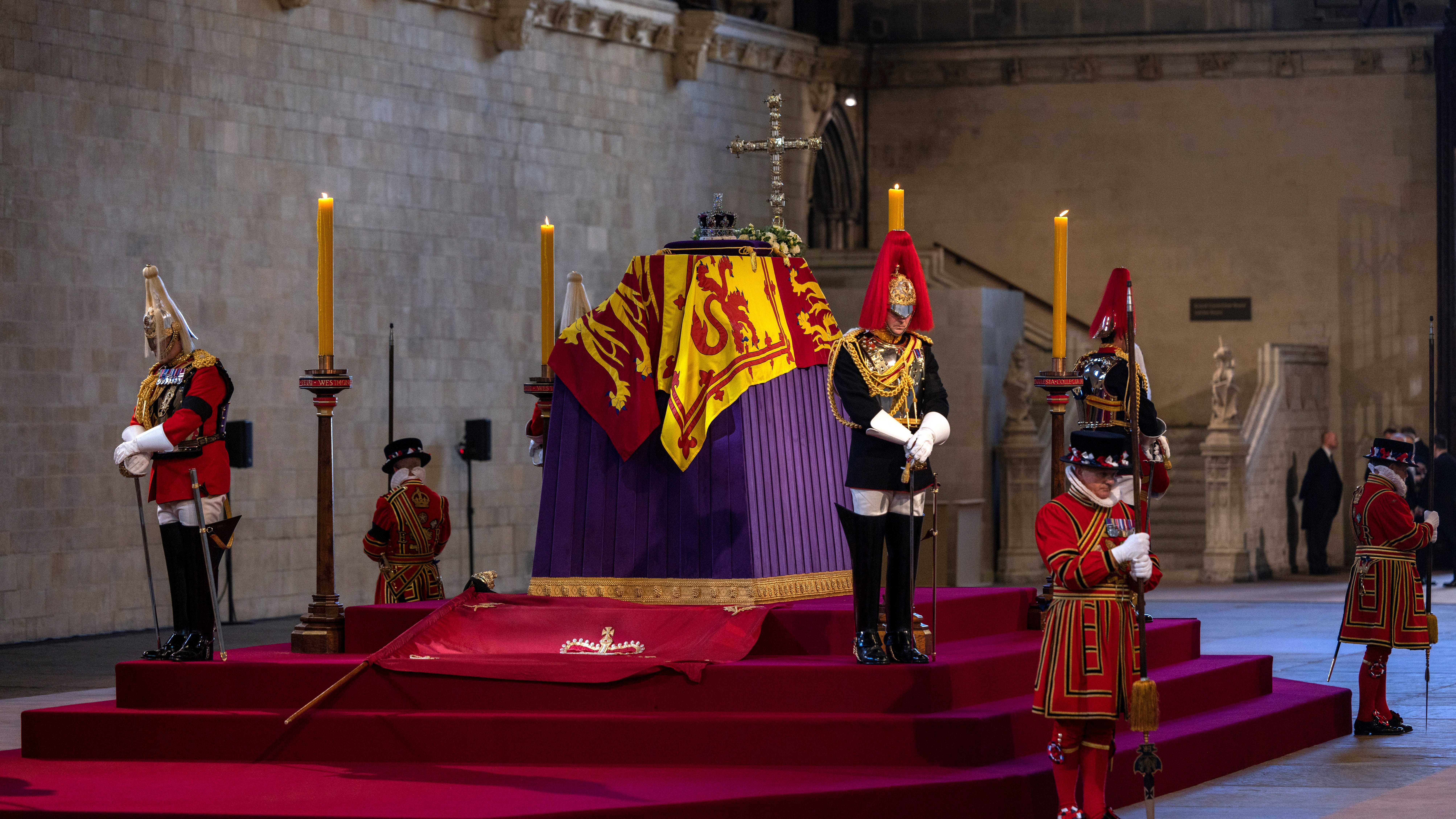 Queen Elizabeth II lies in state after solemn procession