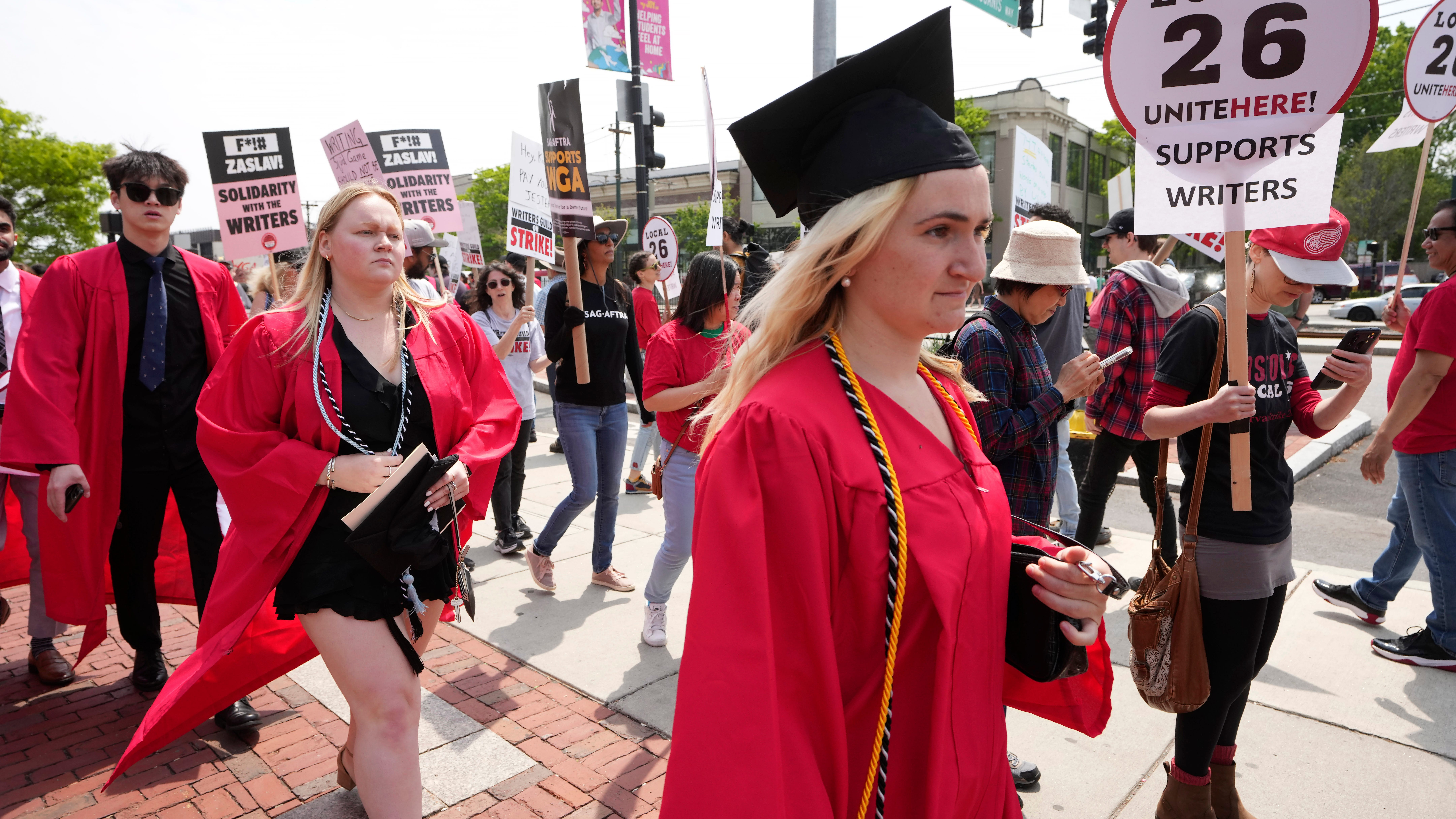 Warner CEO booed at Boston University as supporters of writers' strike picket outside