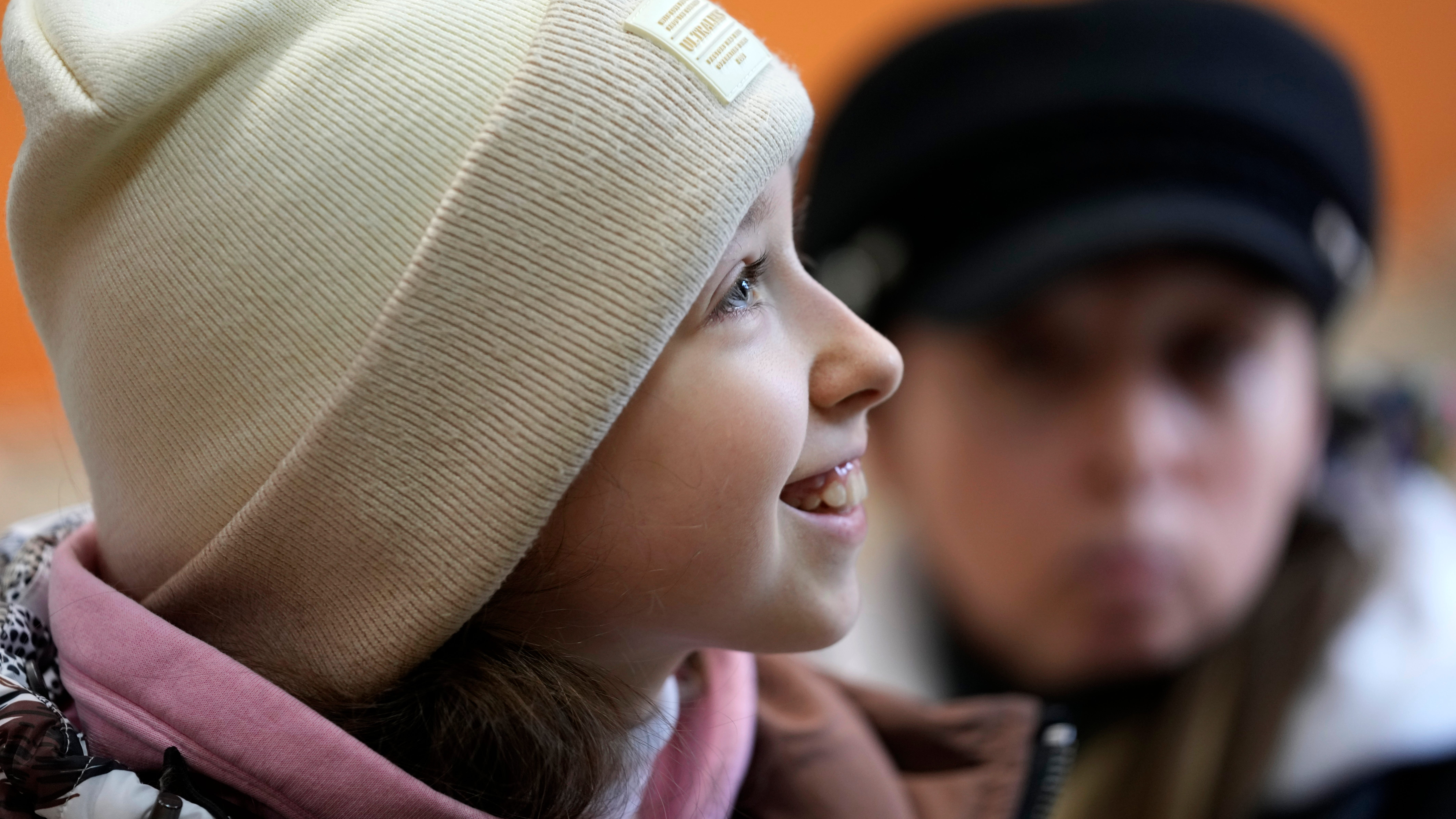 1 million children leave behind lives, friends in Ukraine
