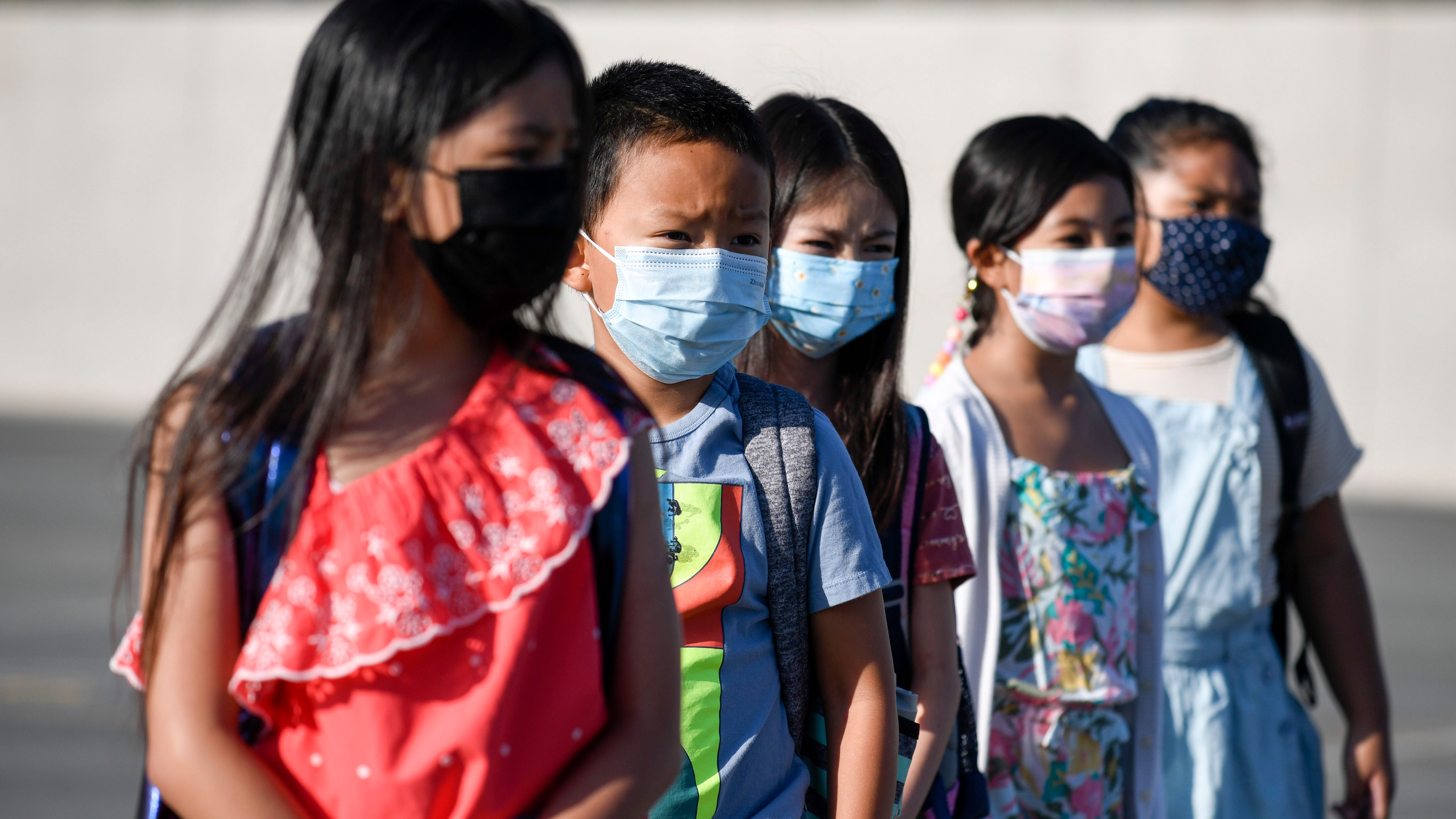 Hugs as California public school returns to class in person