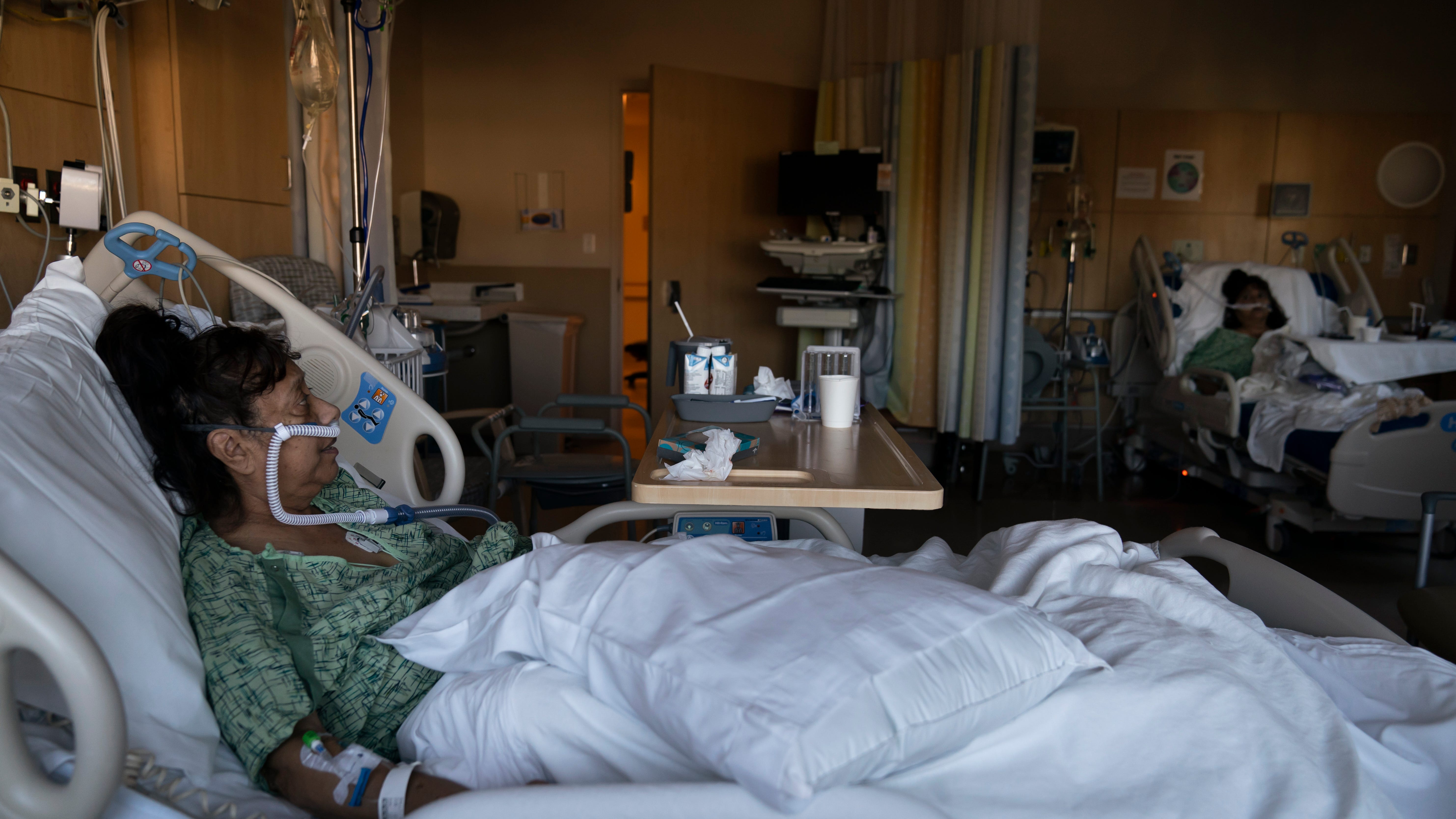 Hits 'keep coming': Hospitals struggle as COVID beds fill  