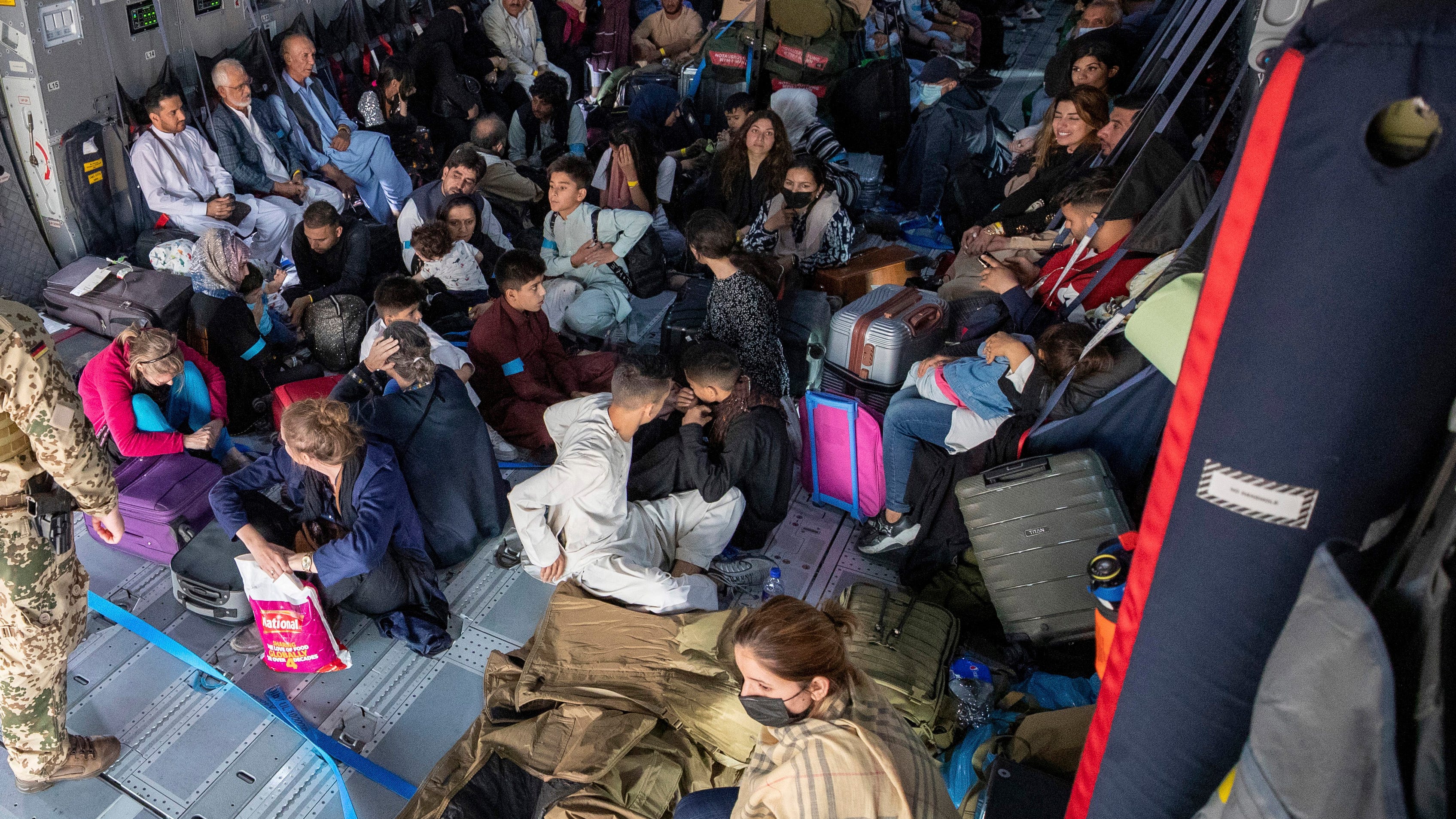 The Latest: Pentagon: 2,000 evacuated from Afghanistan now 