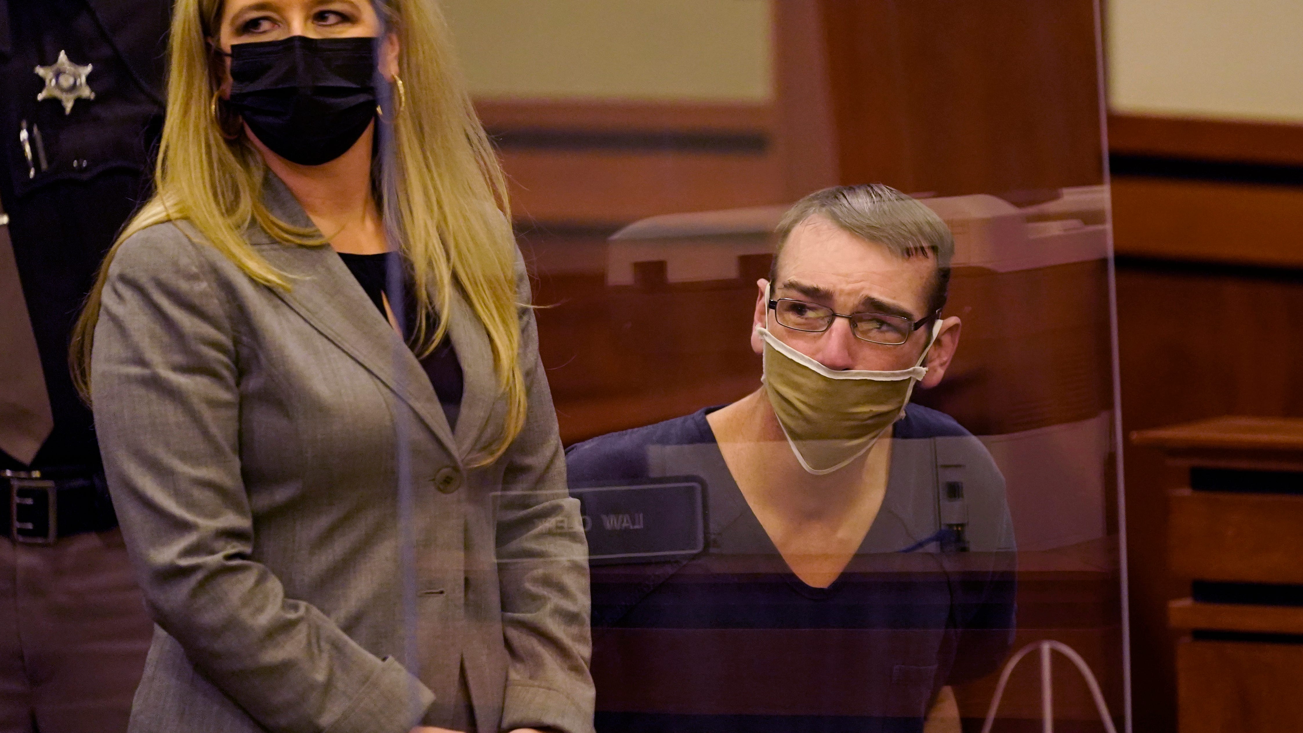 Judge delays case against Michigan school suspect's parents