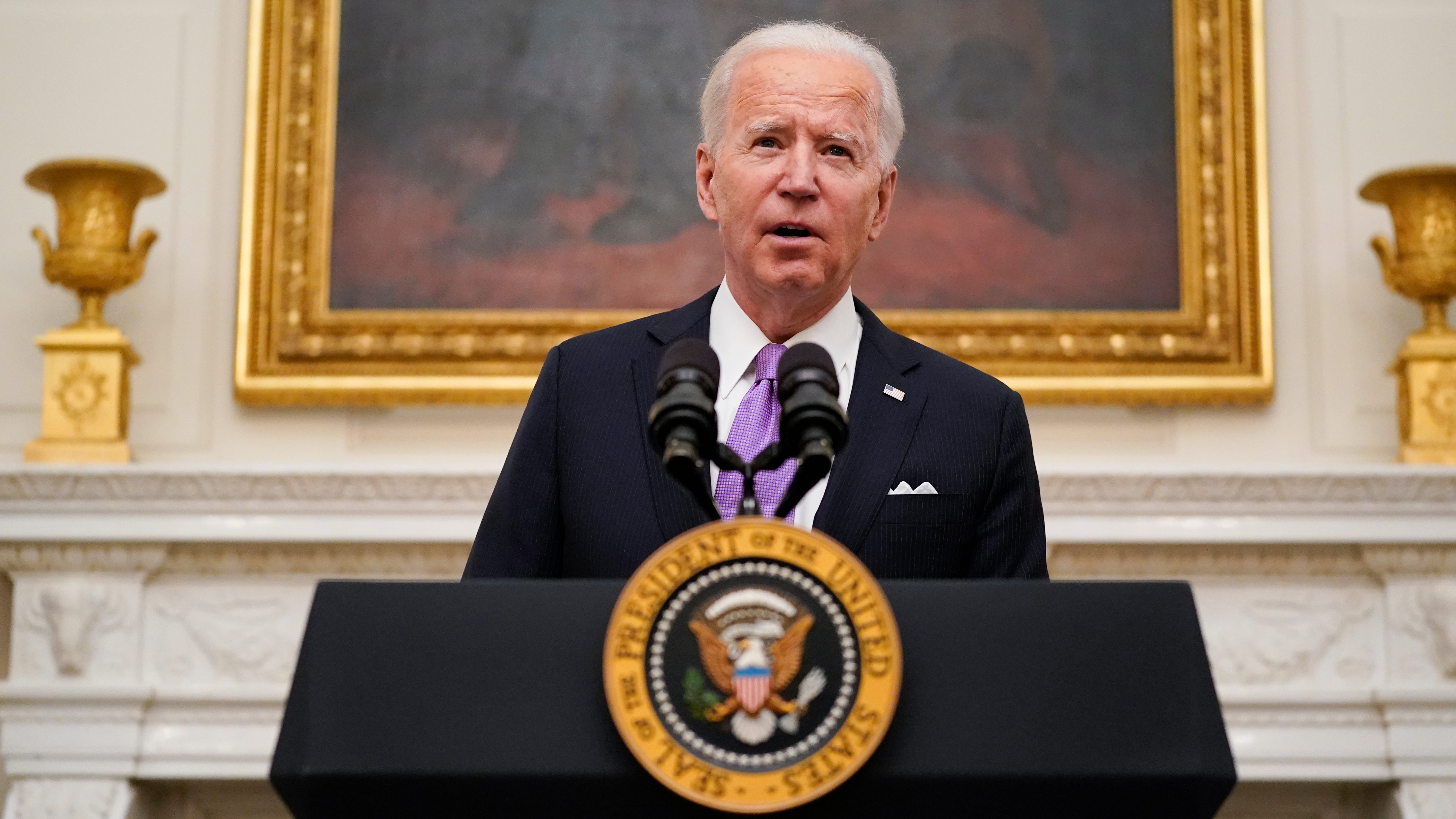 Biden signs burst of virus orders, vows 'Help is on the way'