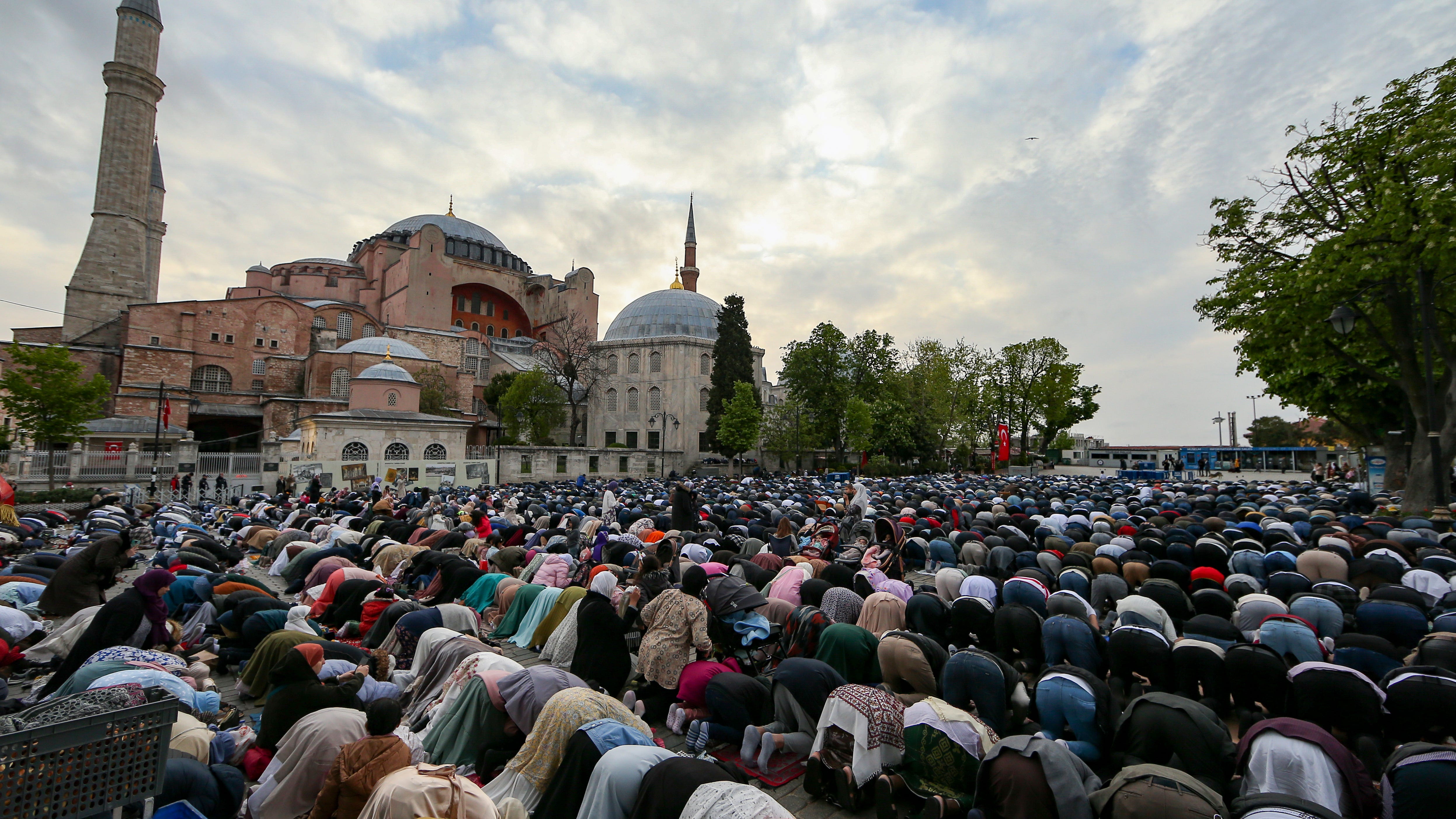 Muslims mark Eid al-Fitr holiday with joy, worry