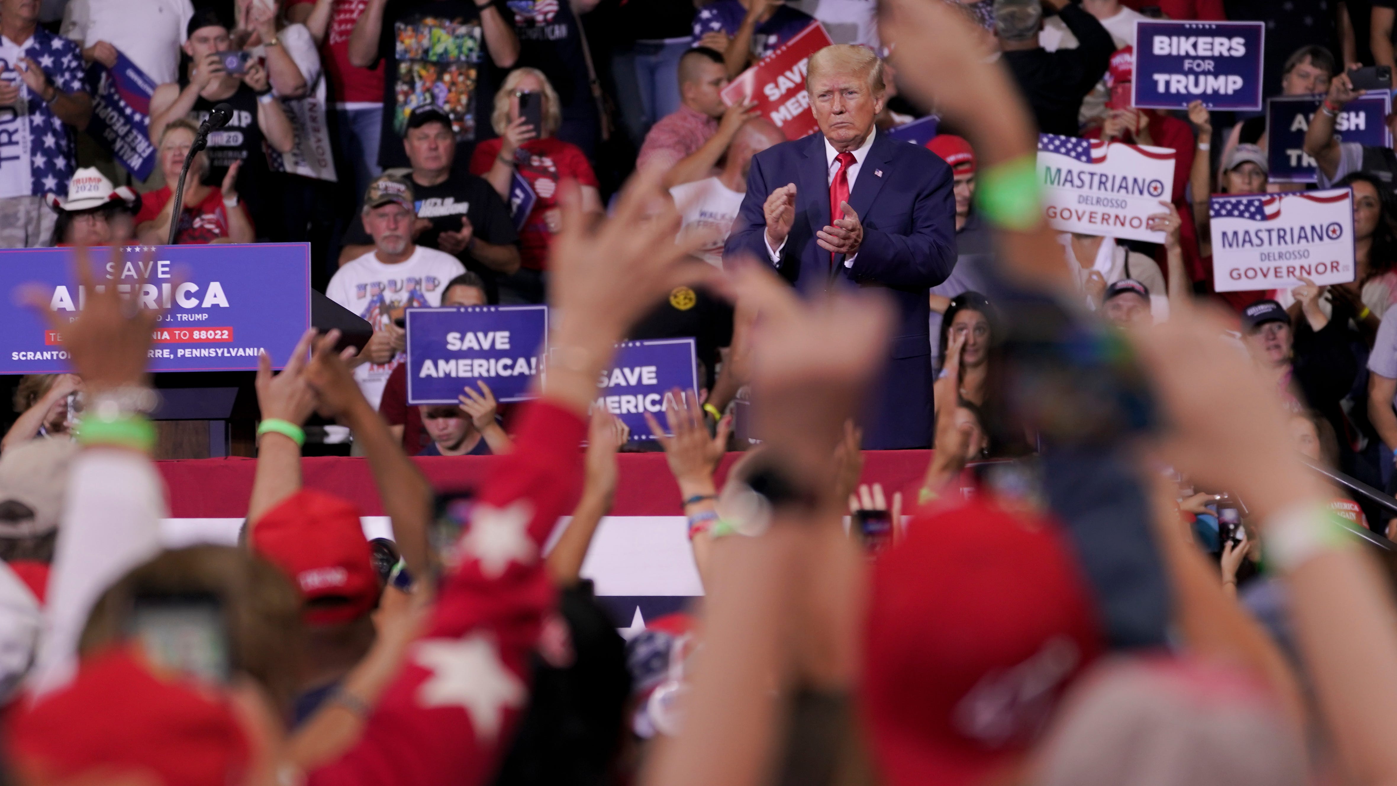 Trump openly embraces, amplifies QAnon conspiracy theories