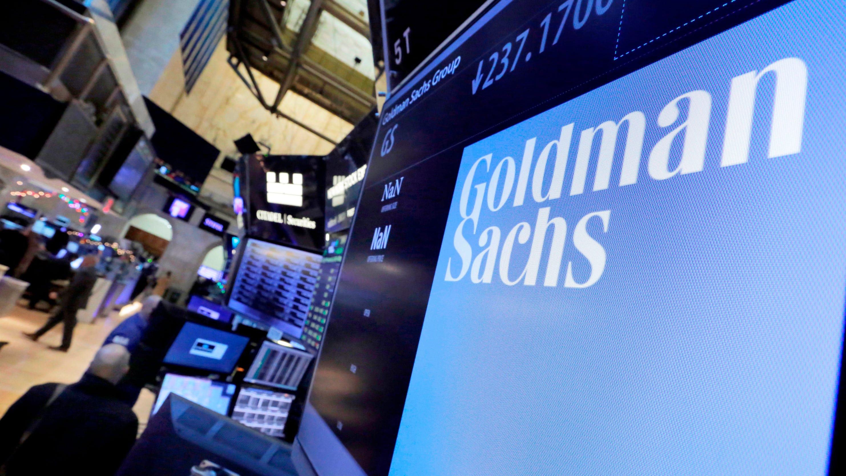 Goldman Sachs 2Q profits beat forecasts; boosts dividend
