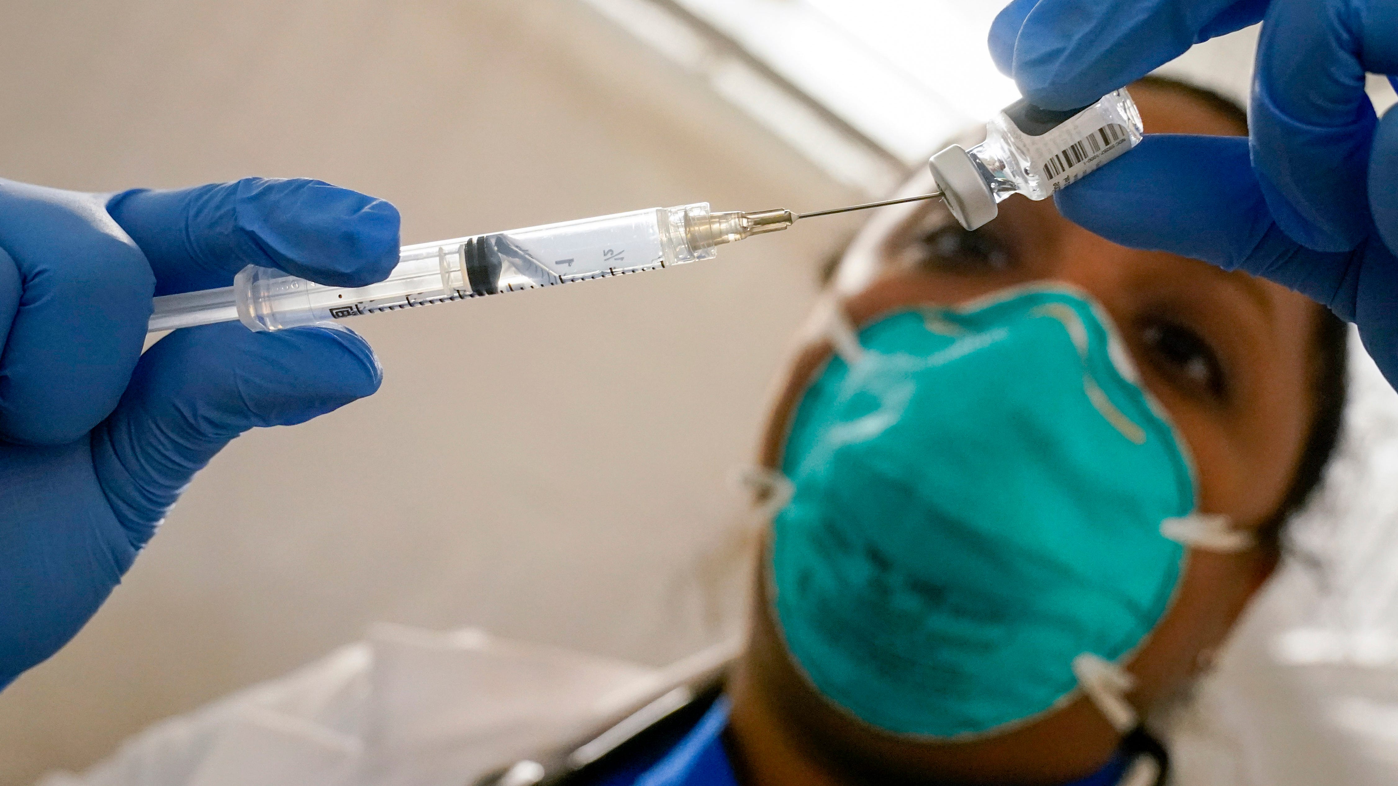 Some in US getting COVID-19 boosters without FDA approval