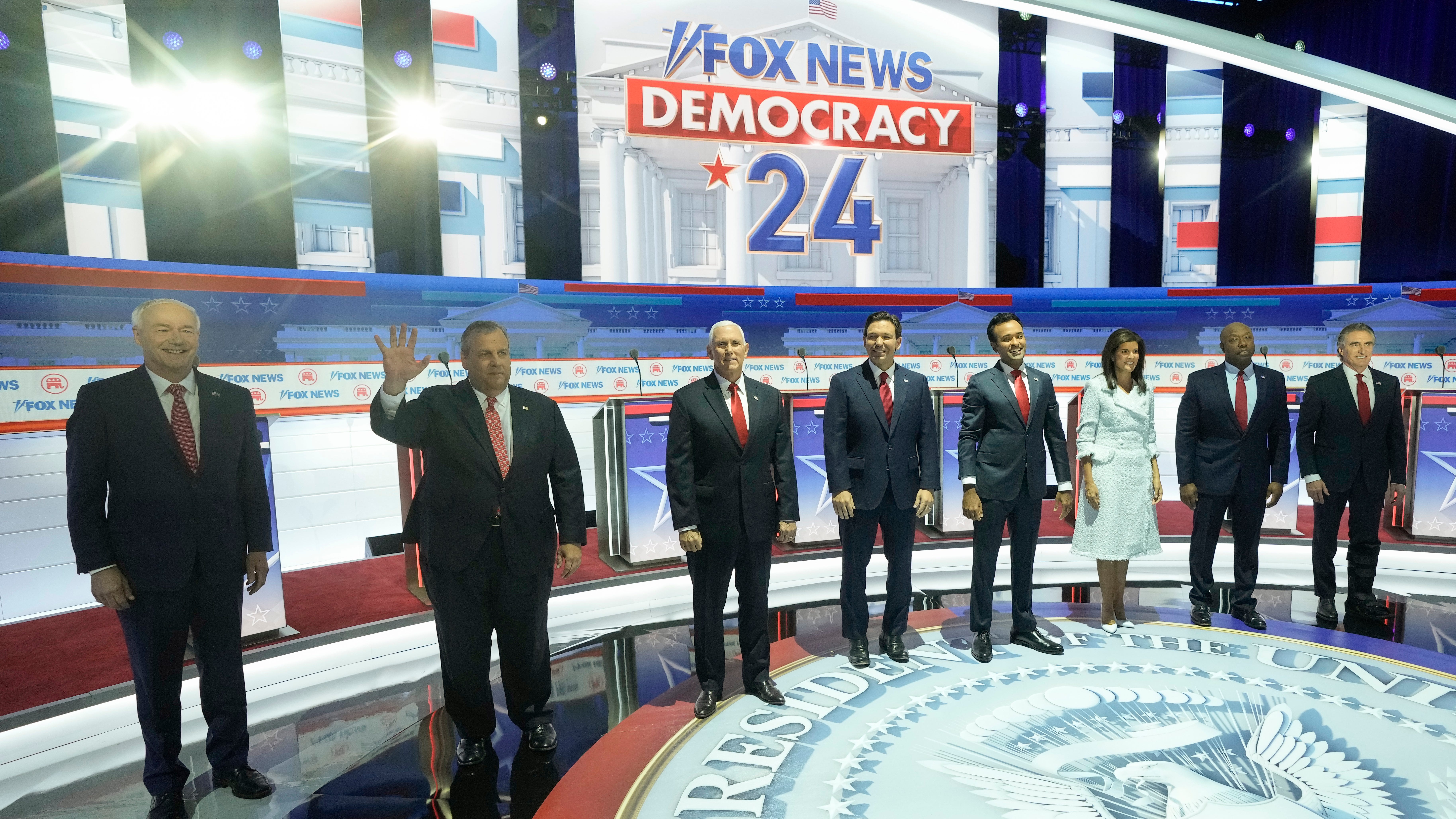 Republican candidates fight each other, and mostly line up behind Trump, at the first debate