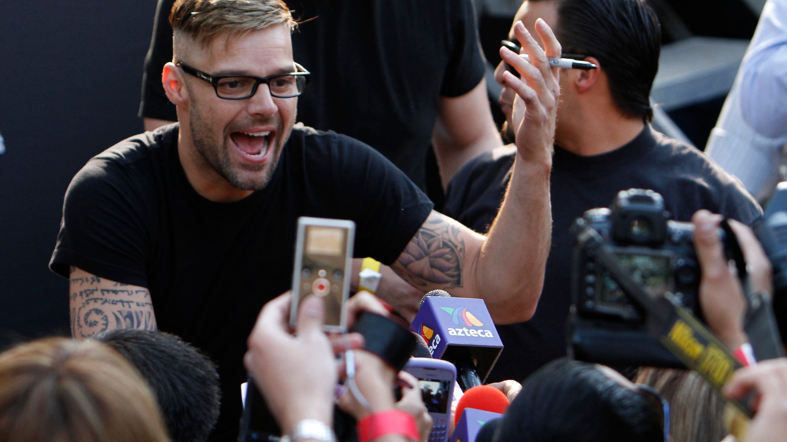 Court closes restraining order case against Ricky Martin