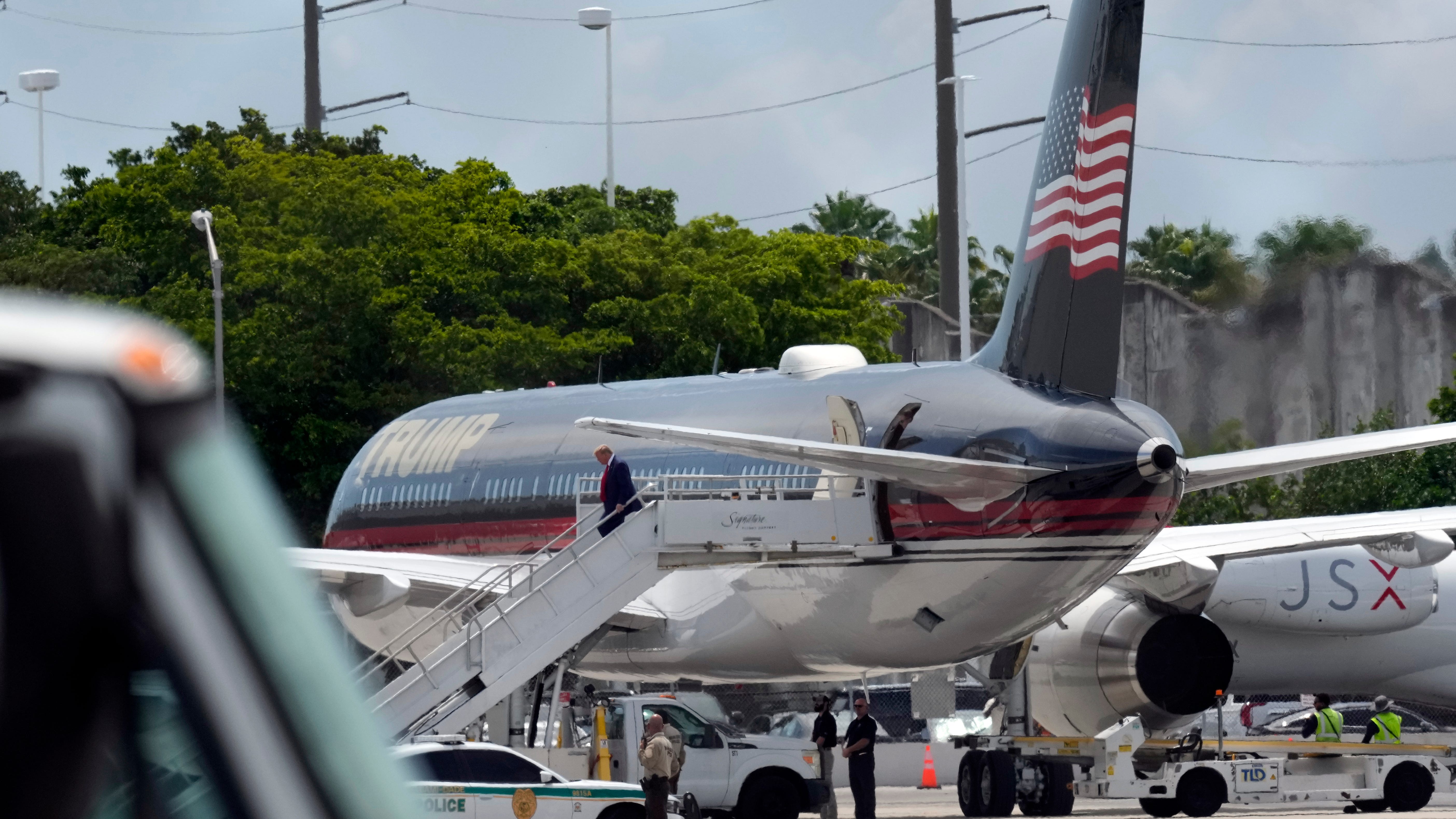 Trump arrives in Florida as history-making court appearance approaches in classified documents case
