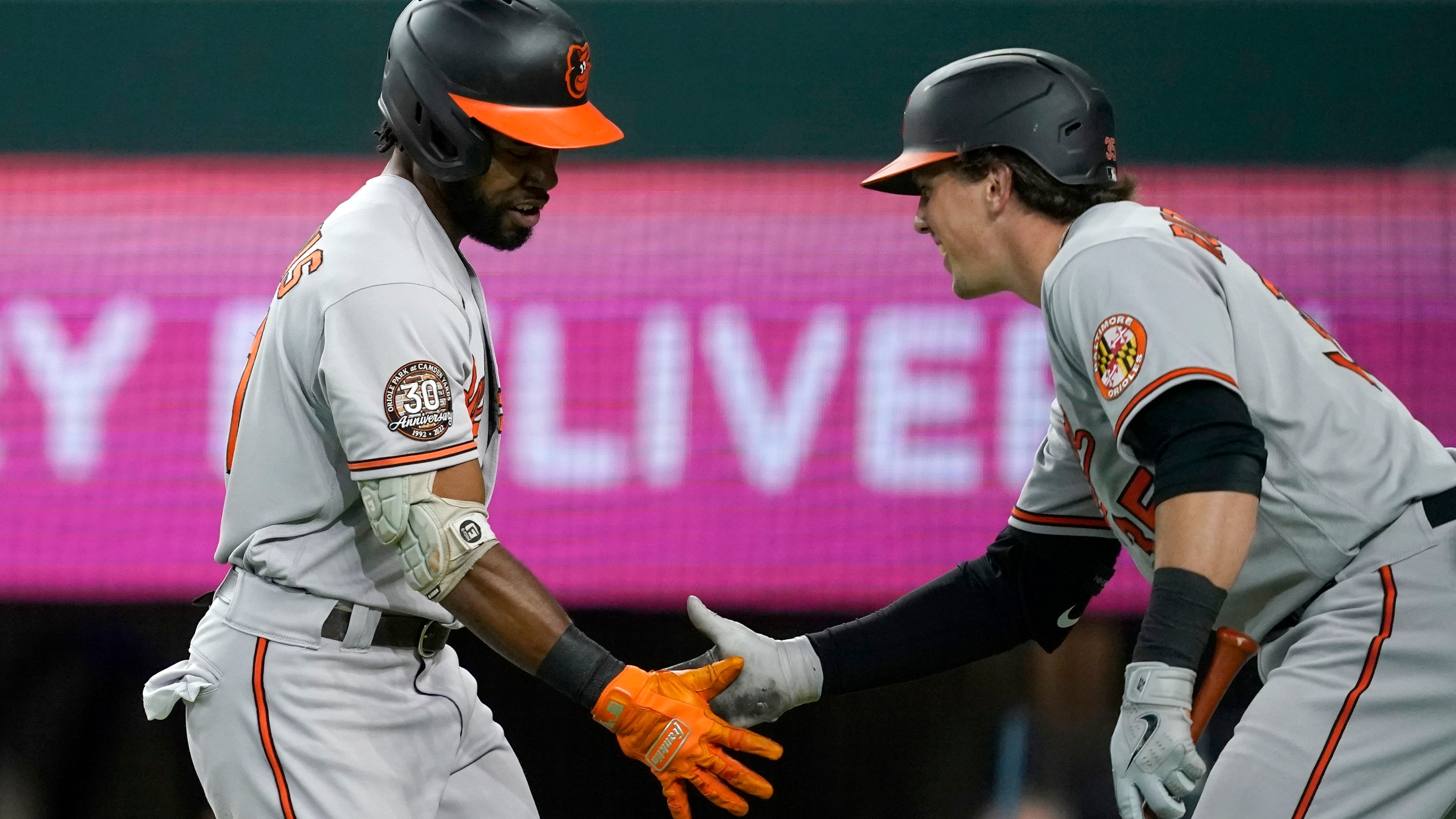 Orioles trade Mancini, then beat Texas 7-2 to match '21 wins