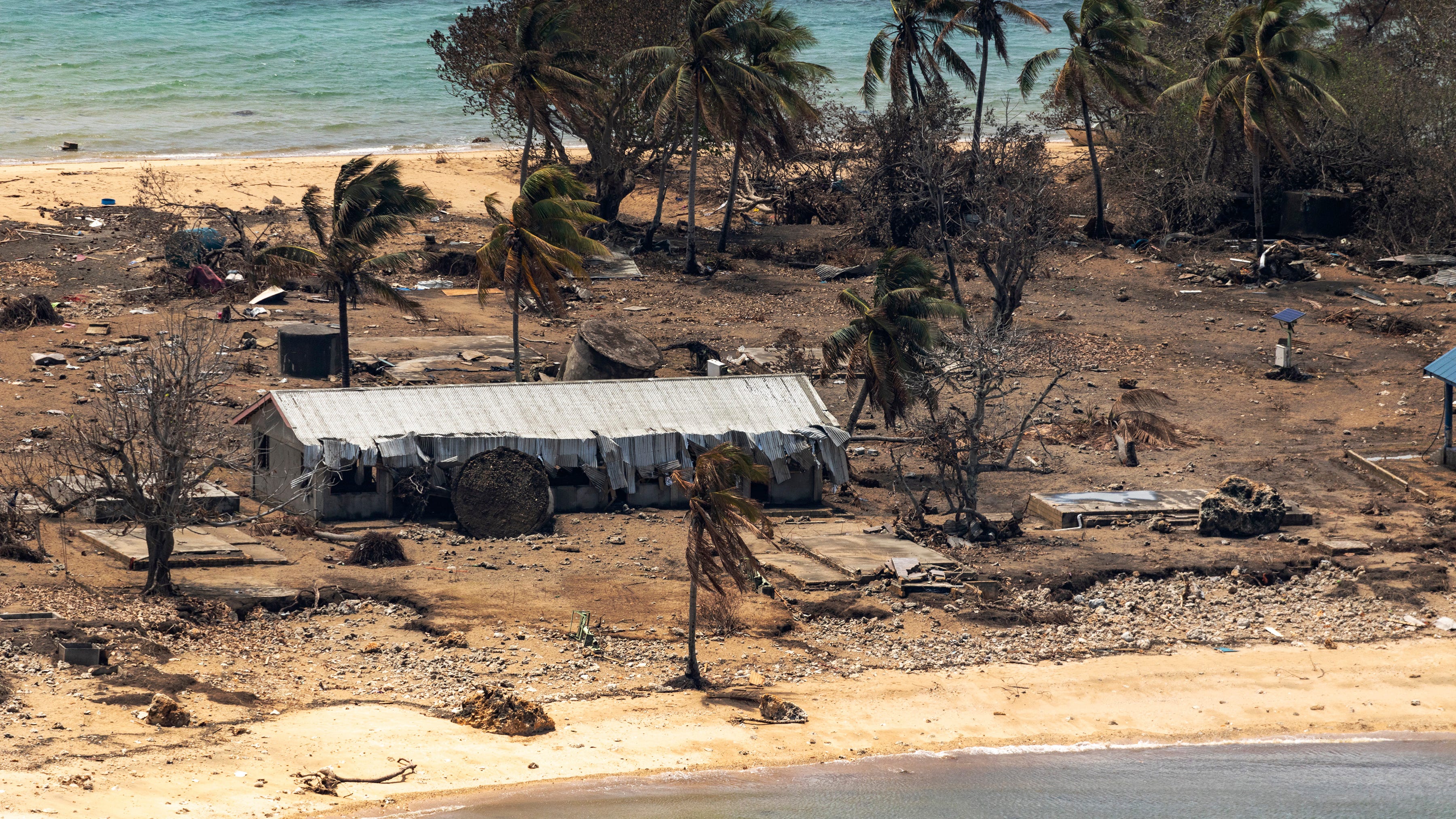 Aid to volcano-hit Tonga brings 1st COVID outbreak, lockdown