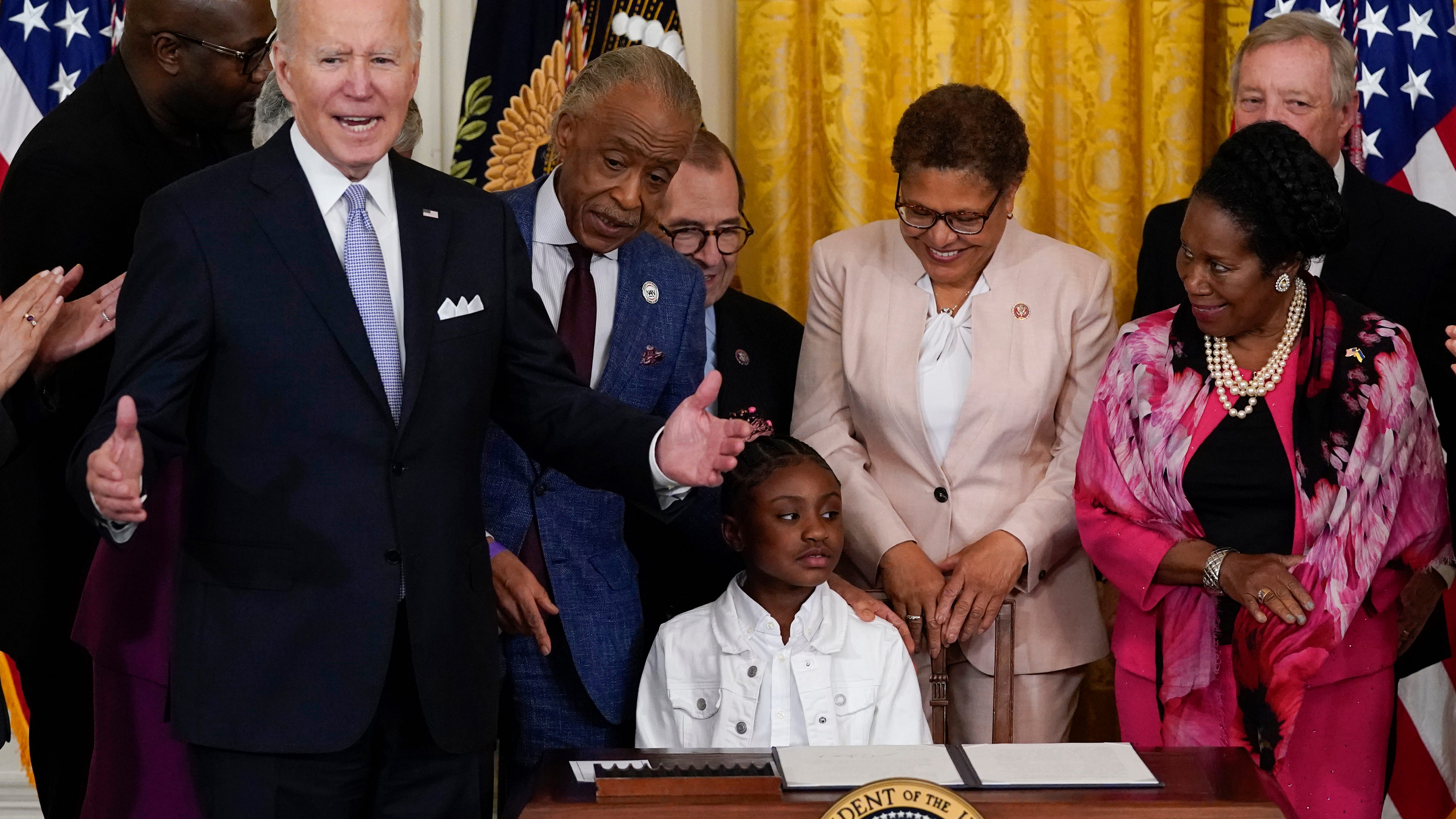 Biden signs policing order on anniversary of Floyd's death