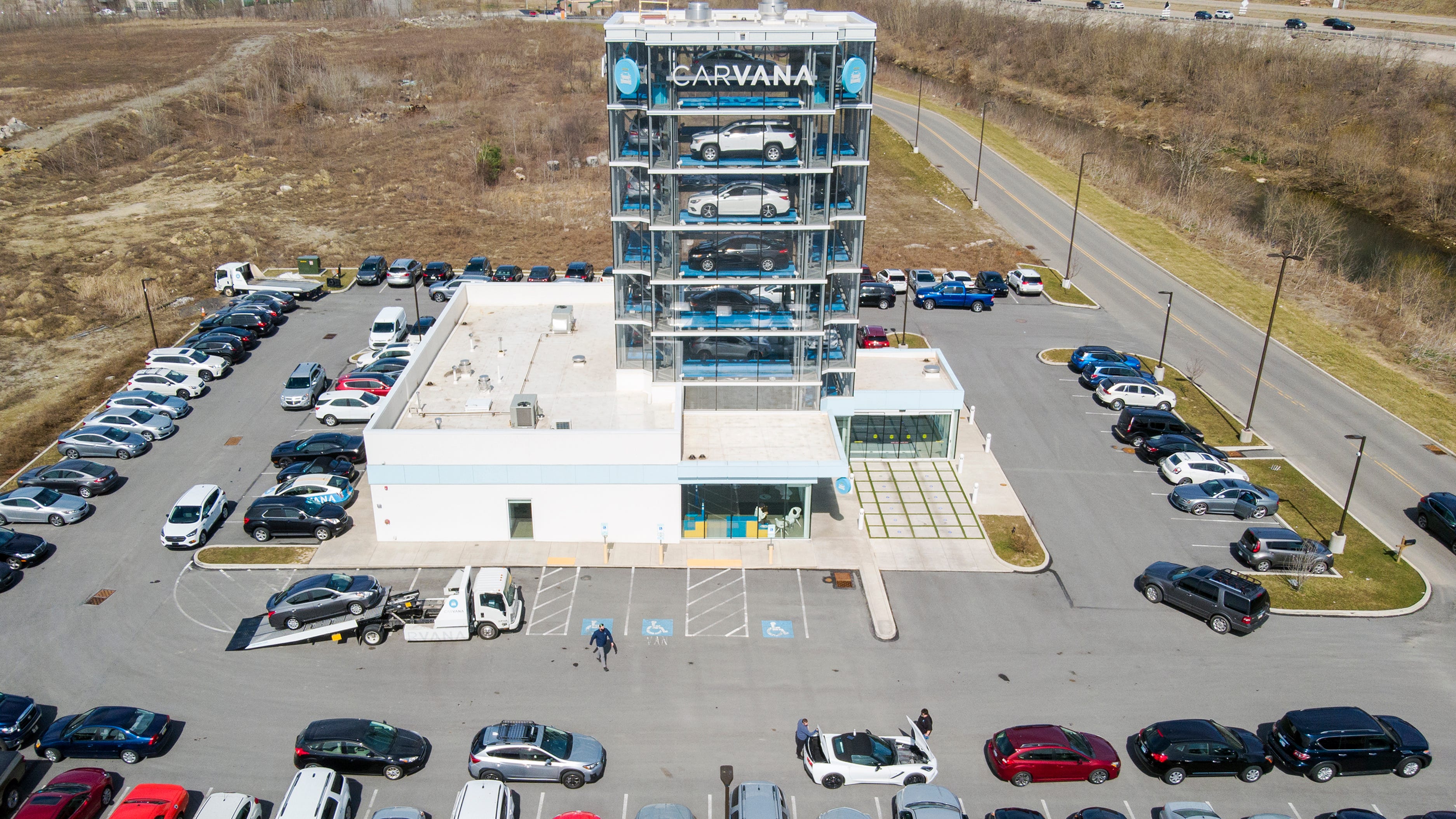 Carvana falls as rising rates, inflation cut used car sales