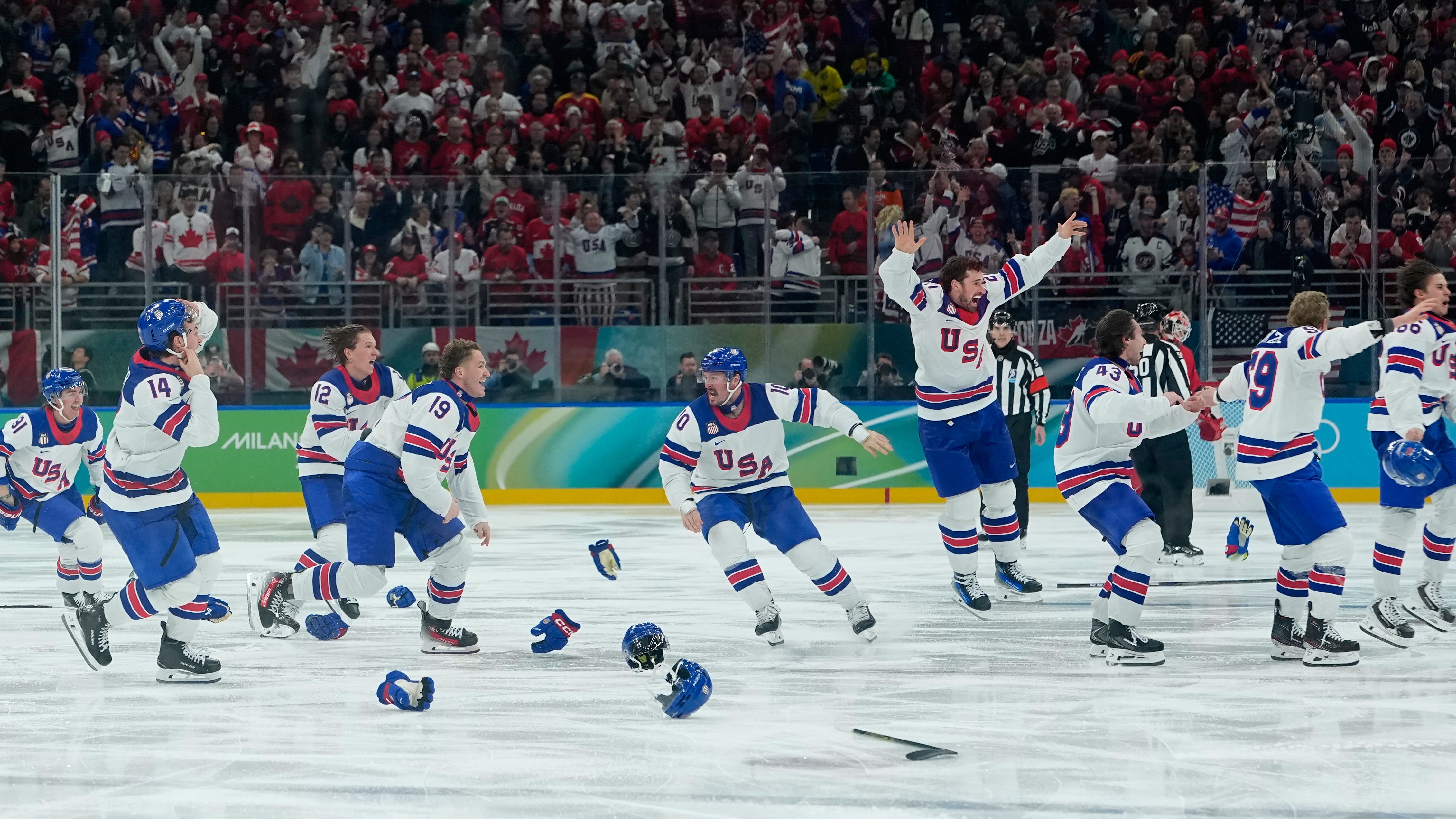 Hughes scores in overtime as US beats Canada for first men's hockey gold at the Olympics since 1980