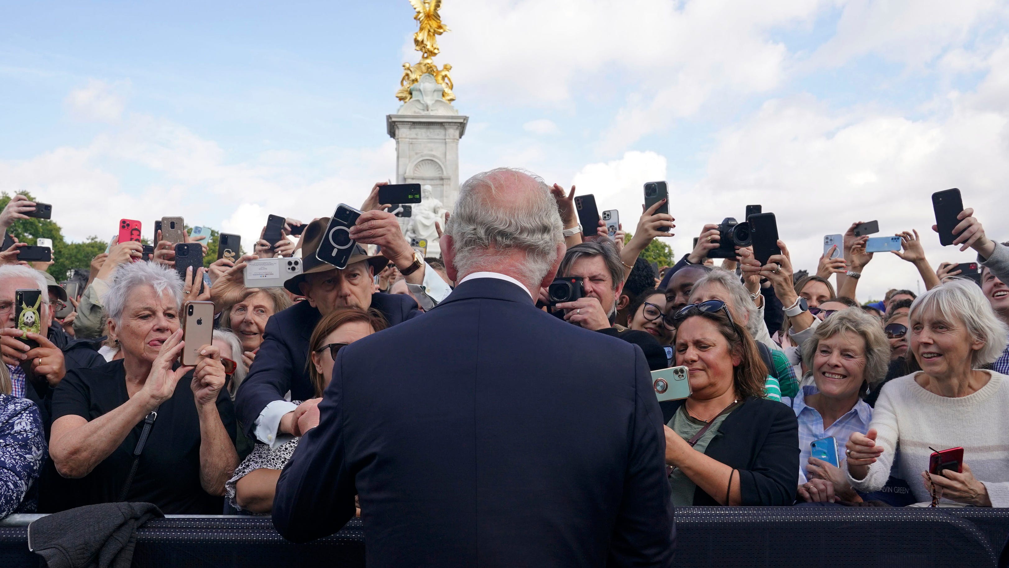 UK watches to see if king departs from mother's traditions