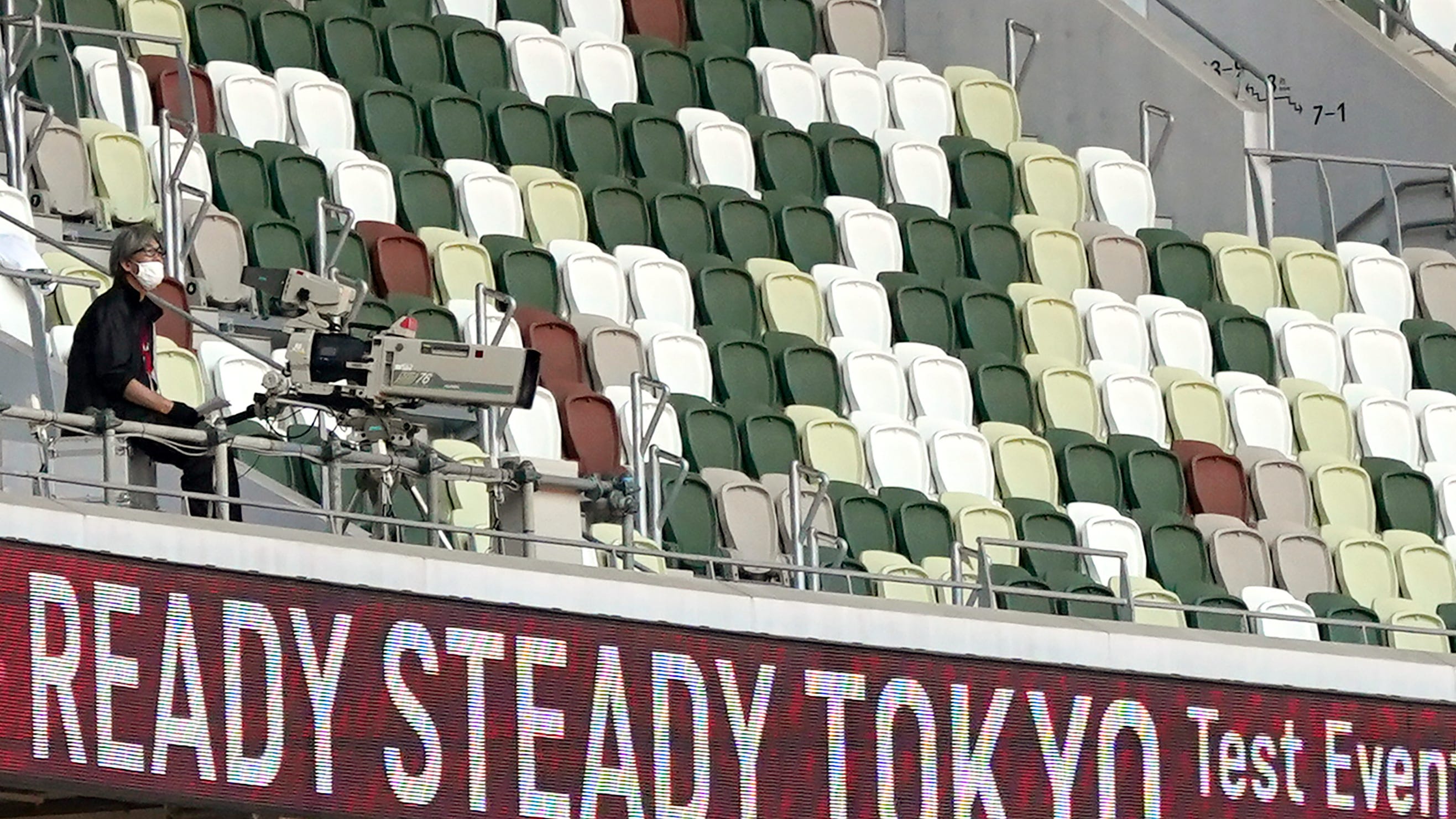 Japan girds for a surreal Olympics, and questions are plenty