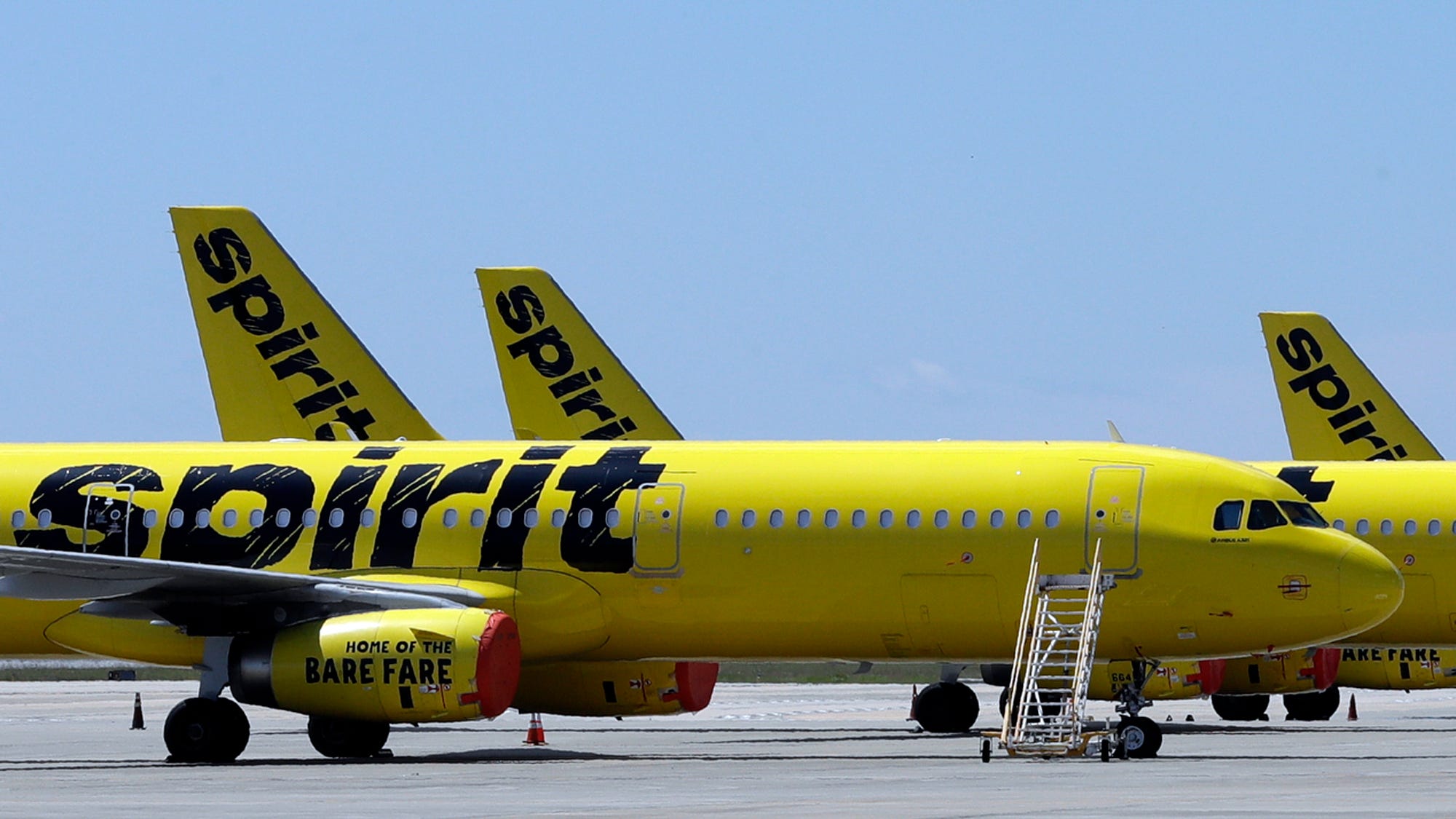 Spirit Airlines, a bidding war target, postpones buyout vote