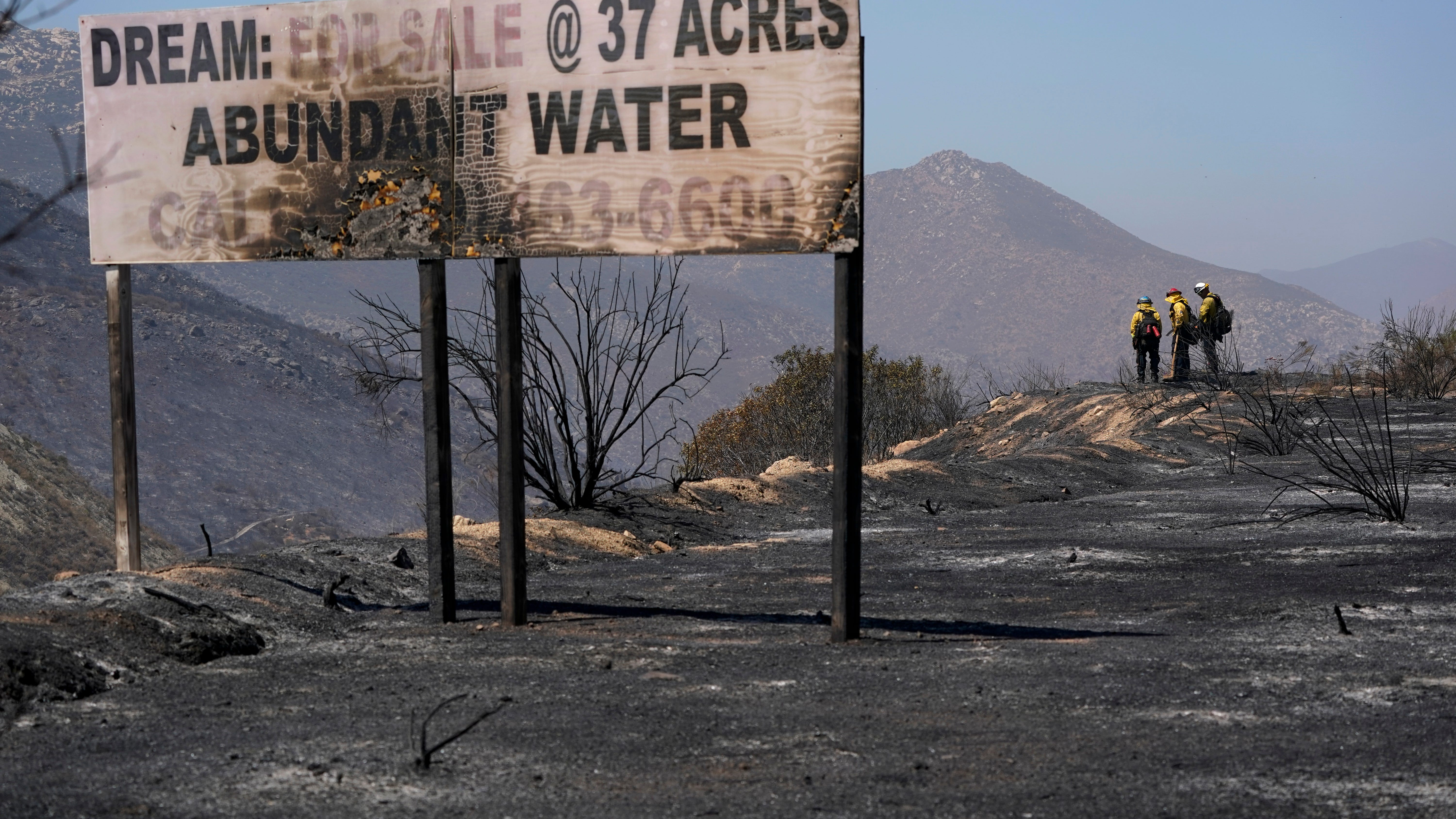 Crews face heat wave along with California wildfires