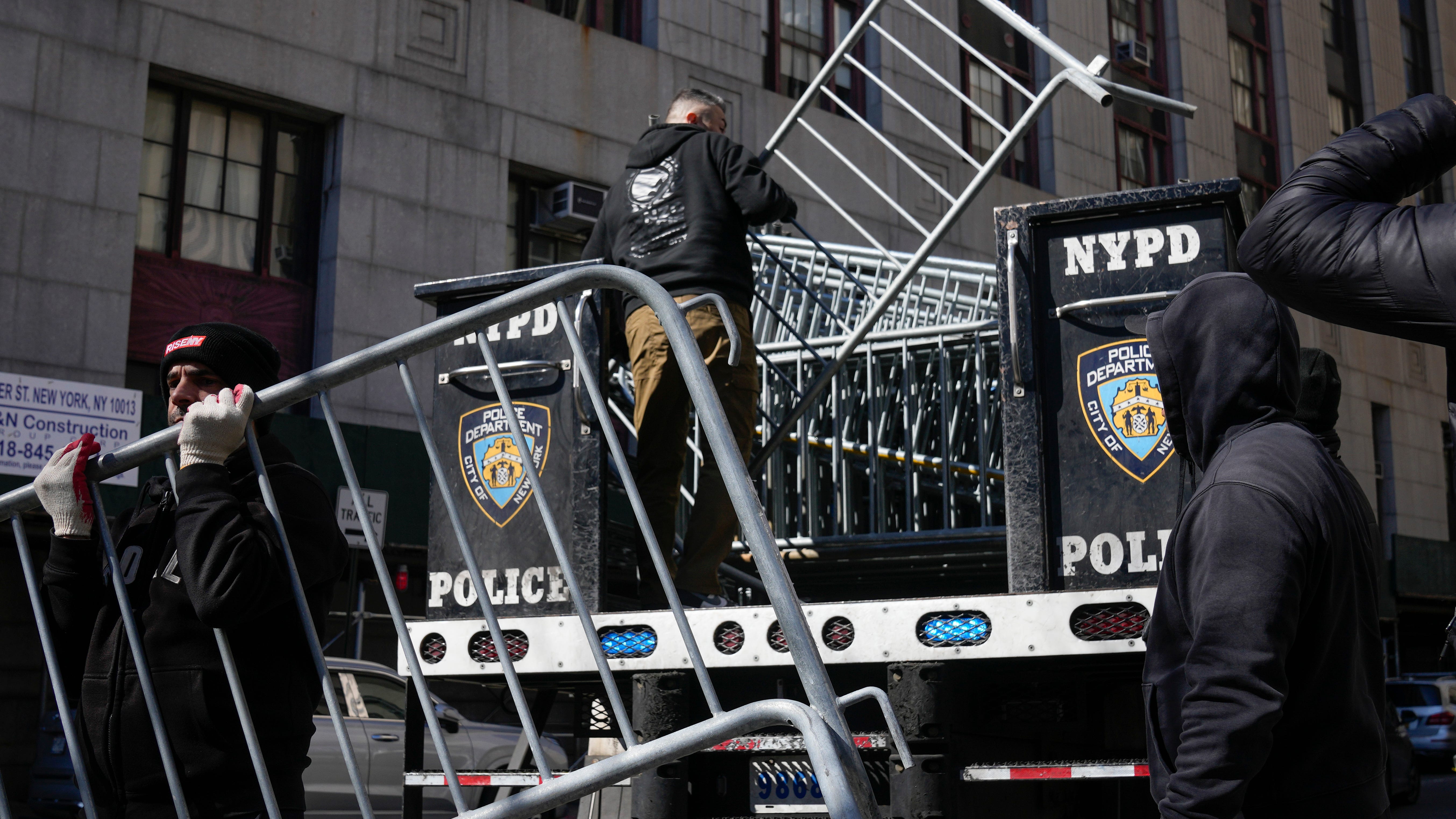 Trump waits out grand jury as New York braces for protests