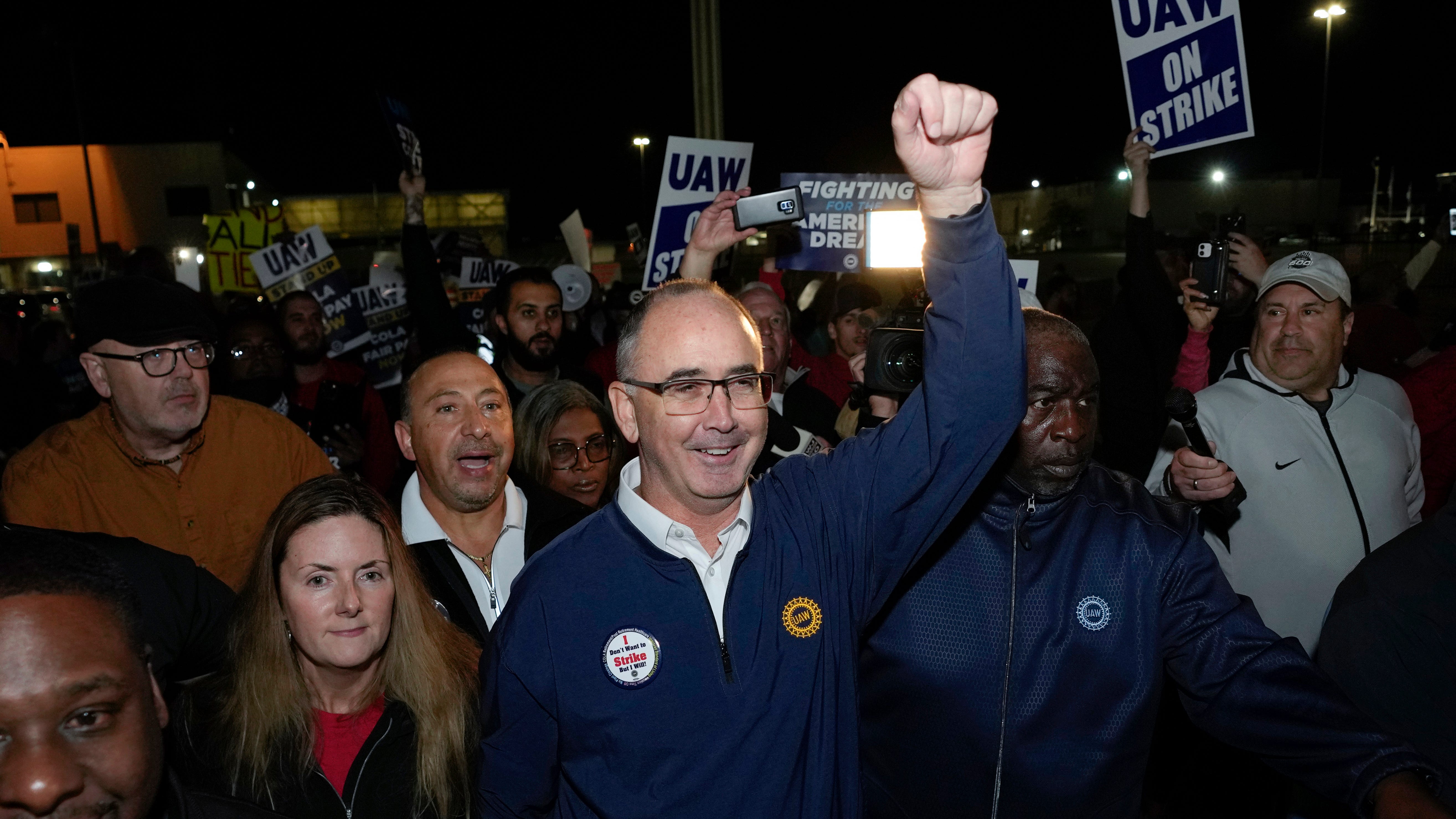 Workers strike at all 3 Detroit automakers in a battle for a bigger share of industry profits